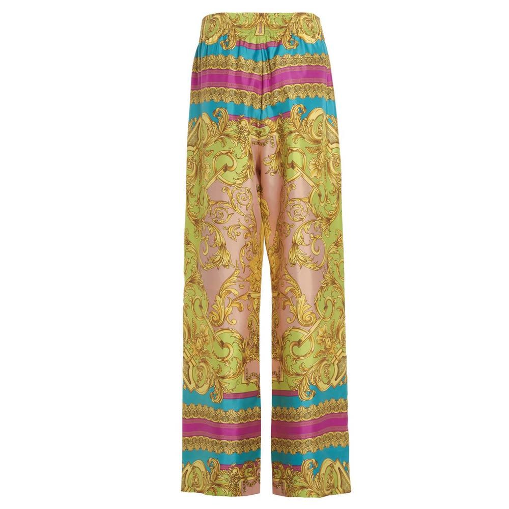 'Barocco Goddess' silk trousers with elastic waistband, wide leg and pockets.