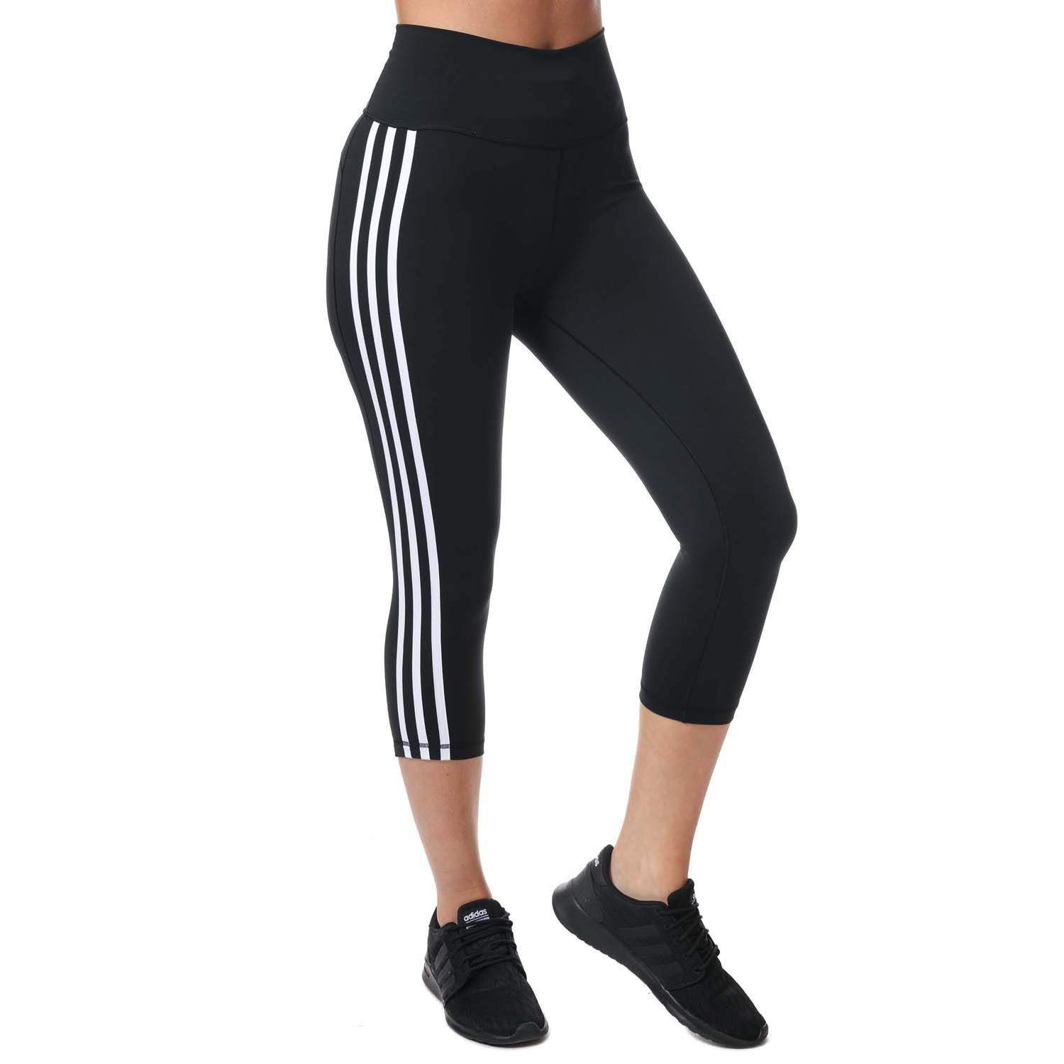 Womens adidas Believe This 2.0 3-Stripes 3-4 Leggings in black - white.- High-rise elastic waist.- Power mesh inner waist pocket.- High-rise three-quarter tights.- Mesh gusset.- Moisture-absorbing AEROREADY.- Tight fit.- Main Material: 64% Nylon  36% Elastane.- Ref: FJ7186