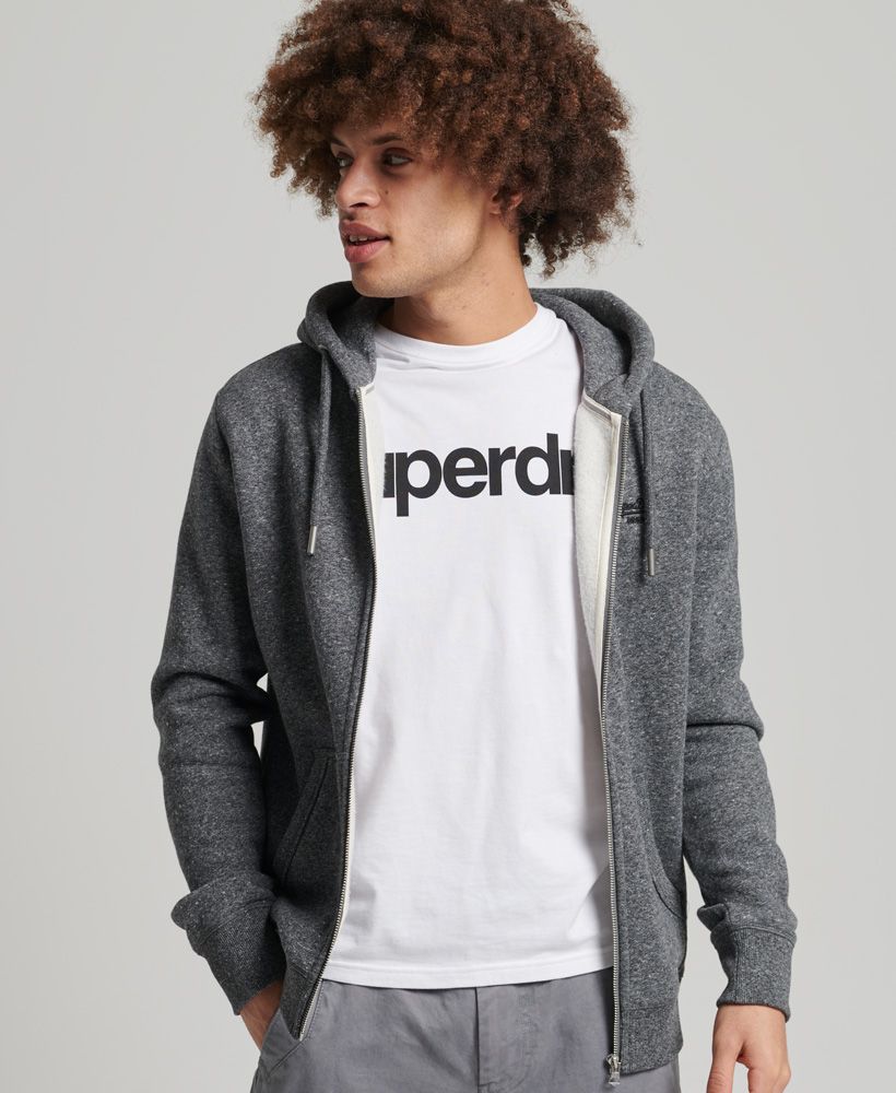 At Superdry, we take a lot of inspiration from the spirit of Americana. Whether you're sporty or enjoy lounging in a cosy hoodie, there's something charming about bundling up as the seasons turn cooler. The Vintage Logo Embroidered Zip Hoodie is one such hoodie with the signature Superdry feel and fashion flexibility.Slim fit – designed to fit closer to the body for a more tailored lookDrawcord hoodZip fasteningLong sleevesFront pouch pocketOrganic cottonEmbroidered Superdry logoSignature Superdry tabMade with organic cotton grown using natural rather than chemical pesticides and fertilisers. The healthier soil this creates uses up to 80% less water which is better for our planet and for the farmers who grow it.