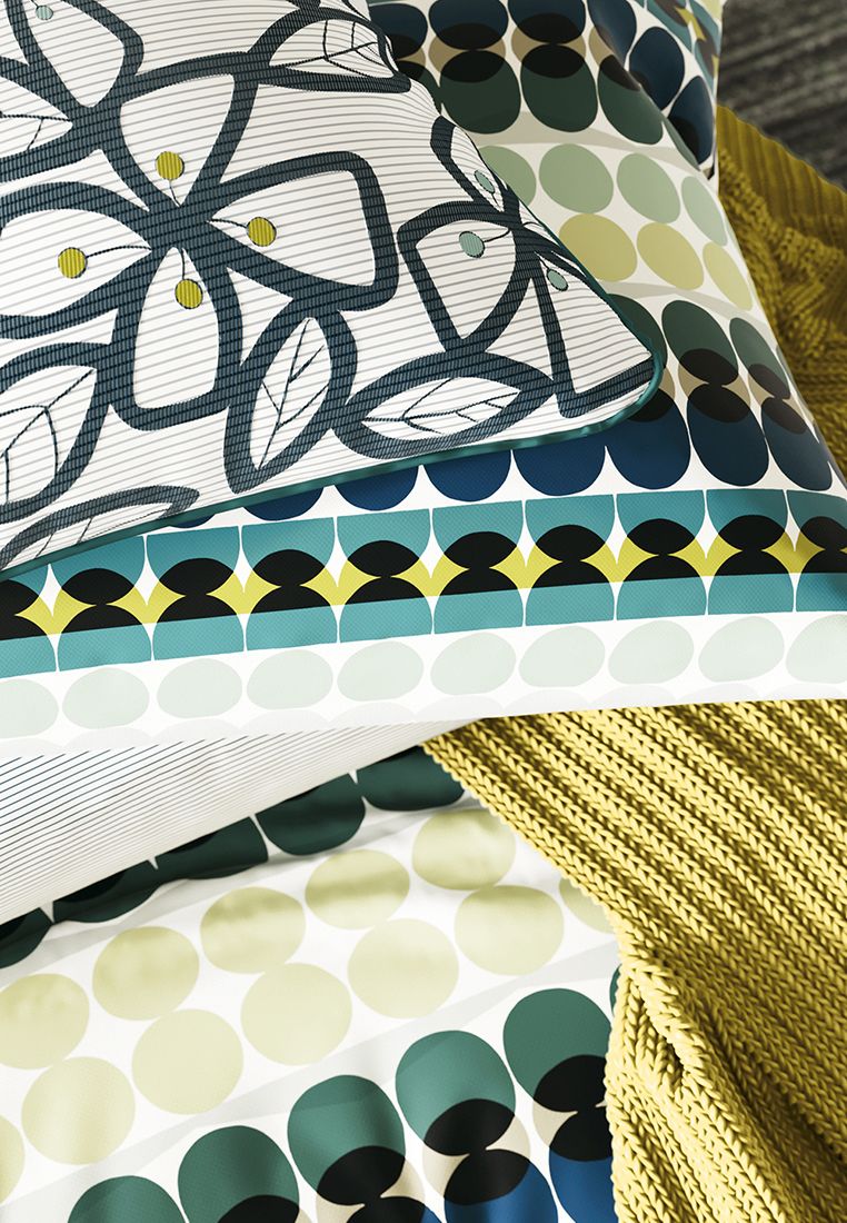 A contemporary all-over spot design, beautifully designed to run vertical in spotty pops of chartreuse, inky navy and teal all on a refreshing white base. Includes Pillowcase(s). Machine Washable. Made in Pakistan.
