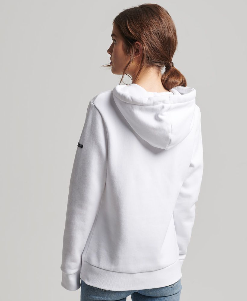 We love to tap into those old-school vibes when it comes to our vintage range, utilising names and locations that evoke nostalgia for the past. In particular, New York City inspires us through the stories of its workmen and rich, unique culture. When you rock this classic hoodie with its signature softness, you'll also be representing our Superdry family in a retro style.Relaxed fit – the classic Superdry fit. Not too slim, not too loose, just right. Go for your normal sizeDrawcord hoodLong sleevesPrinted graphic and logoRibbed cuffs and hemFront pouch pocketSignature Superdry tab