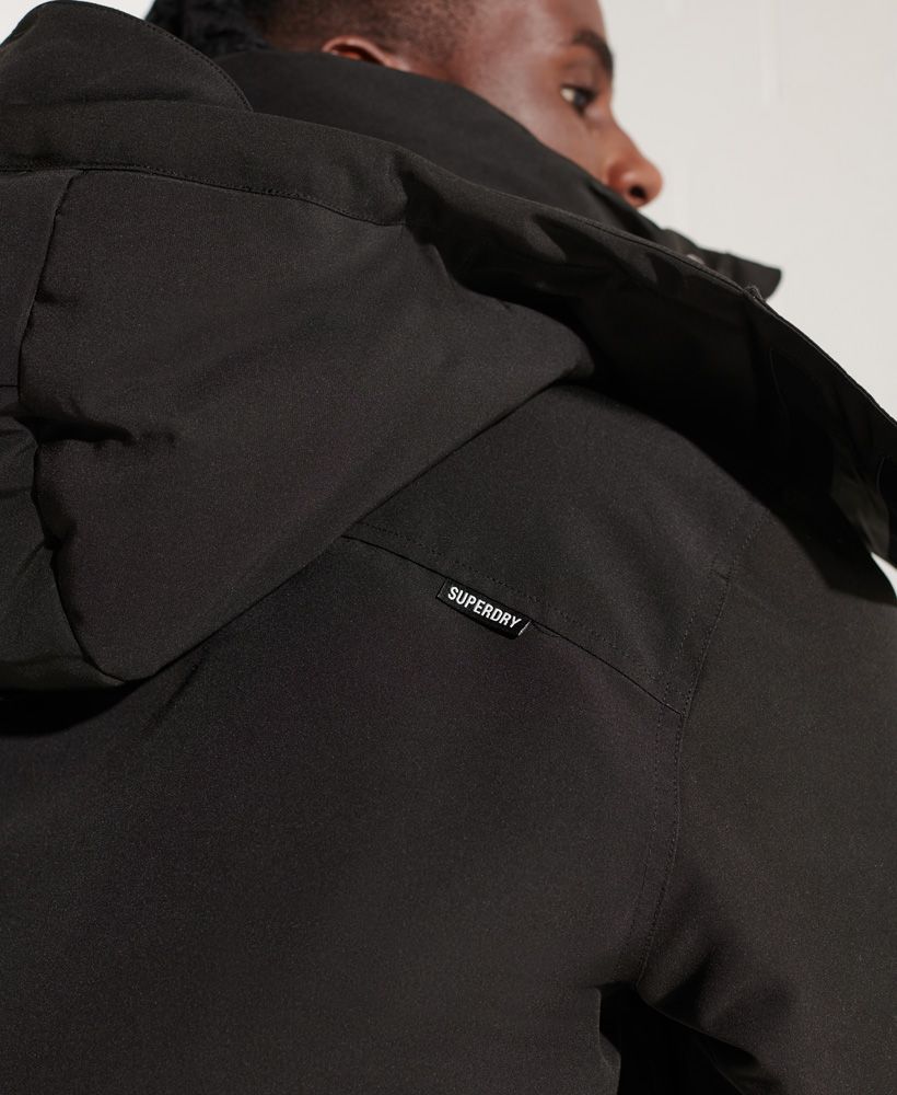Feel prepared for anything with a new jacket this season. With the five-pocket design, detachable hood and ribbed trim for comfort, you'll be able to take on the world.Slim fit – designed to fit closer to the body for a more tailored lookZip fasteningDetachable hoodRibbed cuffs and hemHook and loop adjustable cuffsFour front pocketsInternal mesh pocketFully quilted body & sleeveRecycled paddingSignature Superdry badgeThe padding in this jacket is 100% recycled, each jacket contains over 30 recycled bottles, this avoids these bottles being sent to landfill or polluting our oceans.