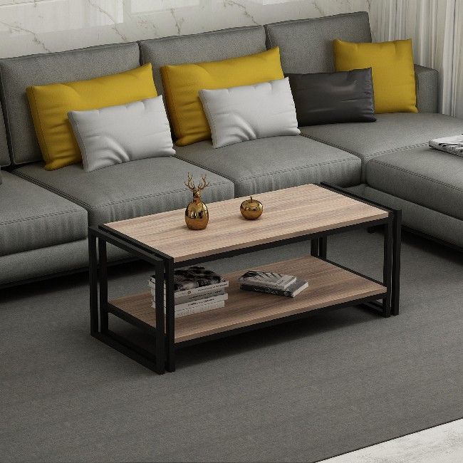 This stylish and functional coffee table is the perfect solution for furnishing the living area and keeping magazines and small items tidy. Easy-to-clean, easy-to-assemble kit included. Color: Walnut | Product Dimensions: W102xD45xH40 cm | Material: Melamine Chipboard, Metal | Product Weight: 15,2 Kg | Supported Weight: 10 Kg | Packaging Weight: W100xD53,5xH9 cm Kg | Number of Boxes: 1 | Packaging Dimensions: W100xD53,5xH9 cm.
