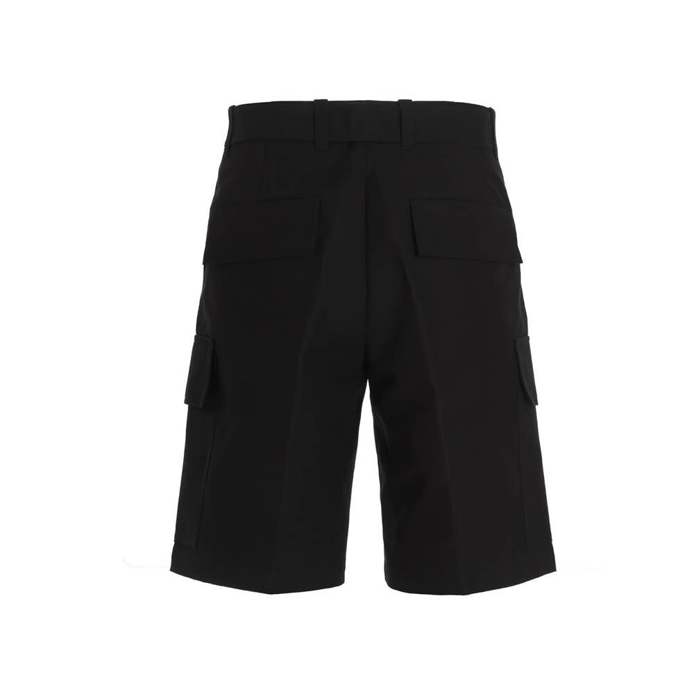 Heavy cotton cargo bermuda shorts with side pockets.