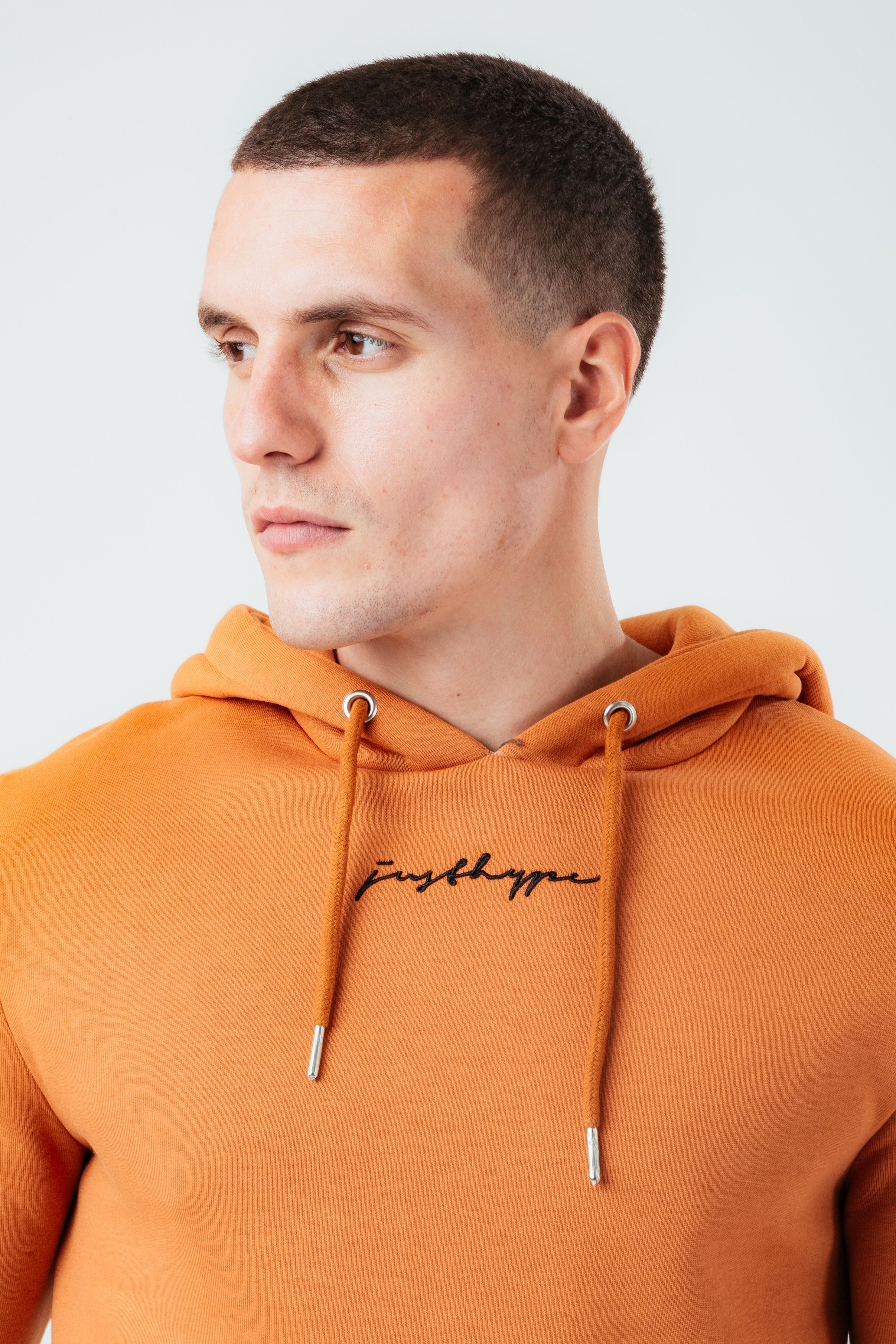 The HYPE. Men's Pullover Hoodie boasts a soft touch fabric base for supreme comfort. Designed in our standard men's pullover shape, with a fixed hood, kangaroo pocket, elasticated hem and ribbed cuffs. The model wears a size M. If you like an oversized fit, go up a size, if you like a tight fit go down a size, for a standard fit, select your usual size. Machine wash at 30 degrees.