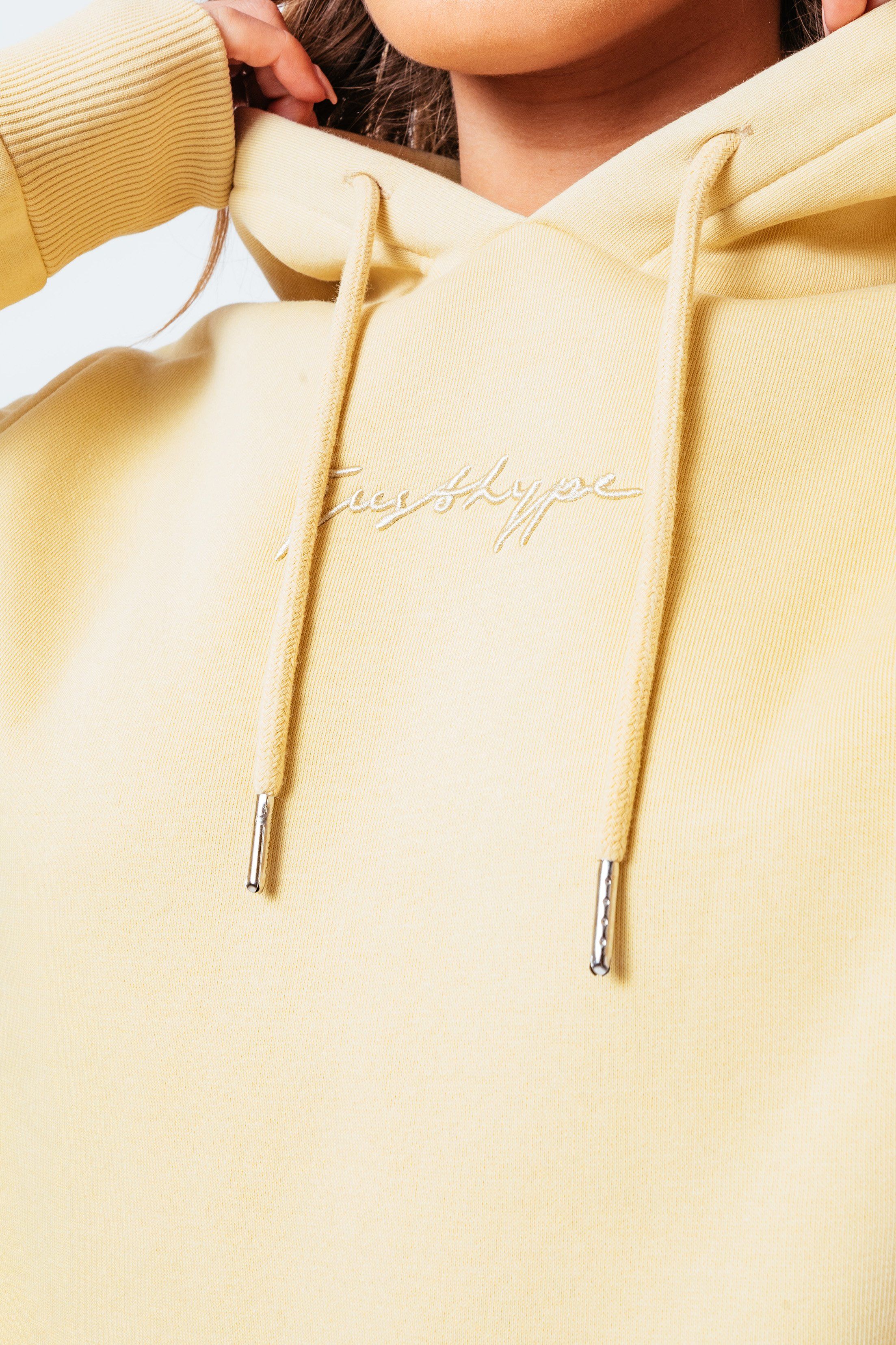 Introducing the freshest loungewear set you've ever seen! The Hype Wheat Scribble Logo Women'S Hoodie & Jogger Set is your new go-to loungewear set when you need that extra comfort boost. Designed in 80% Cotton 20% Polyester for the ultimate soft touch feeling! The Hoodie features a fixed hood, kangaroo pocket, fitted hem and cuffs, finished with drawstring pullers and embossed justhype embroidery across the front in the same colour. The Joggers highlight an elasticated waistband, fitted cuffs and double pockets with tonal drawstring pullers and embossed justhype embroidery on the side of the leg. Wear together or stand alone with a pair of box fresh kicks. Machine washable. 