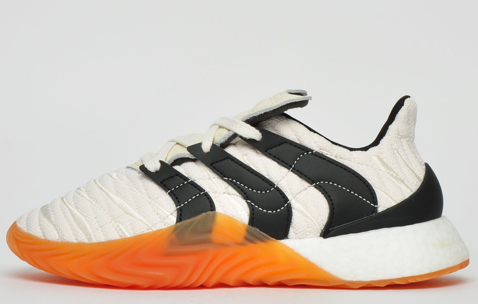 <p>Inspired by the passion of football, Adidas have given the Predator-inspired Sobakov an update, introducing an exclusive Boost midsole, along with a new Accelerator-styled look.</p> <p>Featuring the same rippled upper in a textured knit with designer stitch detailing as well as the famous three stripe branding in a curve design with an on trend wave styled outsole for a standout design with an additional heel cup featuring around the ankle for added support</p> <p class=