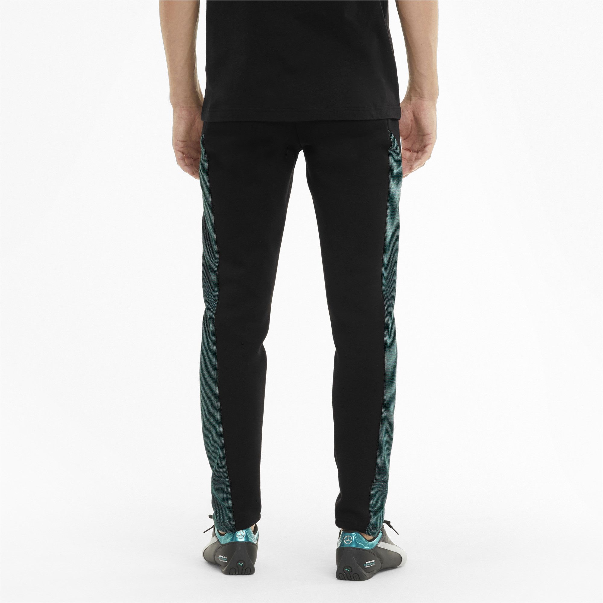 PRODUCT STORY

For high-octane fan style, these two-tone, double-sided sweatpants have a slim fit and showcase the Mercedes-AMG Petronas Motorsport badge and PUMA Cat Logo at the legs. The internal drawcord waistband and welt zip pockets are slick details that enhance the feeling of quality.

FEATURES & BENEFITS

By buying cotton products from PUMA, you’re supporting more sustainable cotton farming. 
DETAILS

Our model is 183 cm tall and is wearing size M
Slim fit
Open cuffs
Mercedes-AMG Petronas F1 badge at leg
PUMA Cat Logo at leg
Cotton and polyester