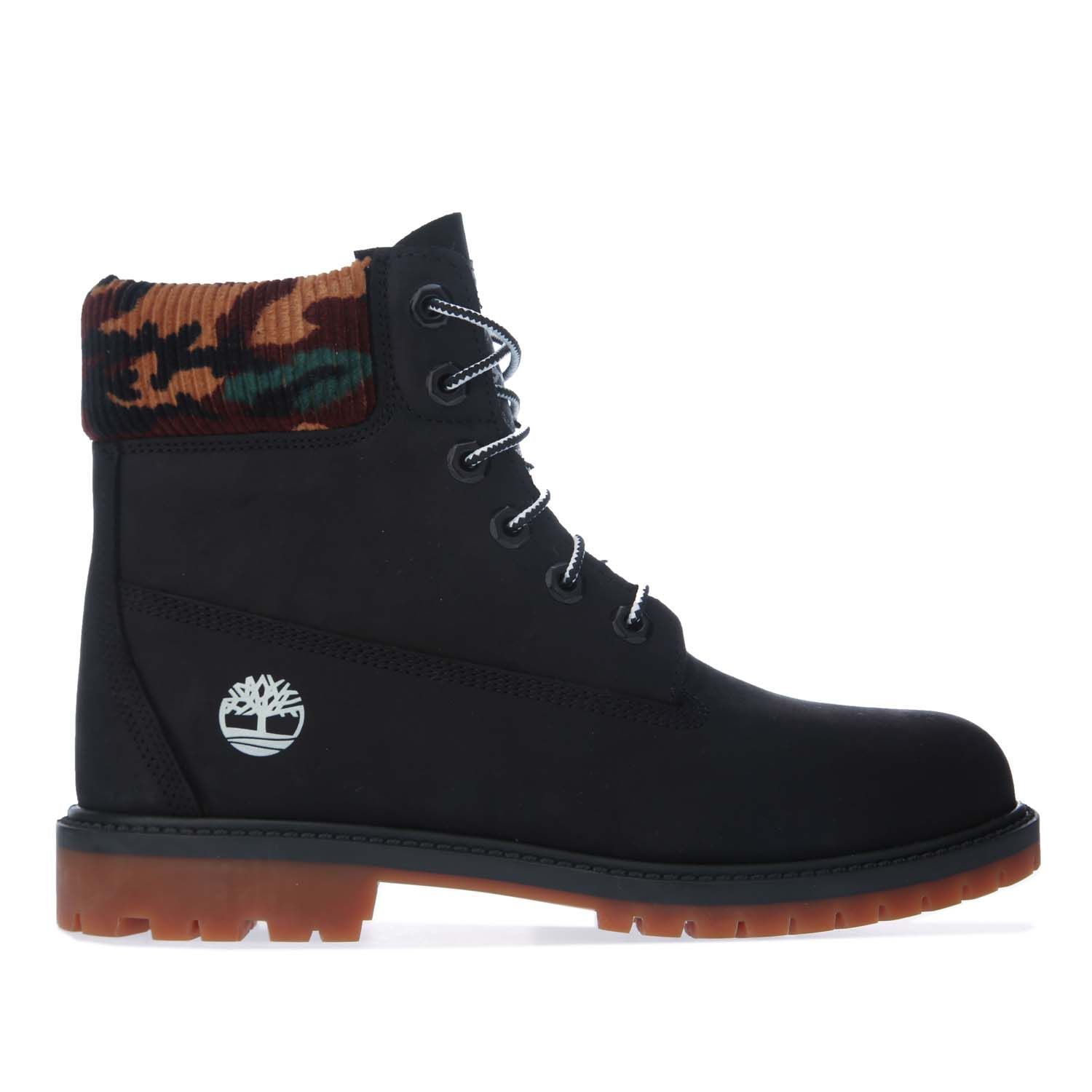 Womens Timberland 6 Inch Heritage Cupsole Boots in black.- Nubuck leather upper.- Lace up style.- Seam-sealed waterproof construction.- Contrast padded cuff.- Round toe.- Anti-fatigue footbed.- EVA midsole for lightweight cushioning.- Lugged tread.- Durable rubber outsole.- Leather upper  Leather lining  Synthetic sole.- Ref: CA2M7T