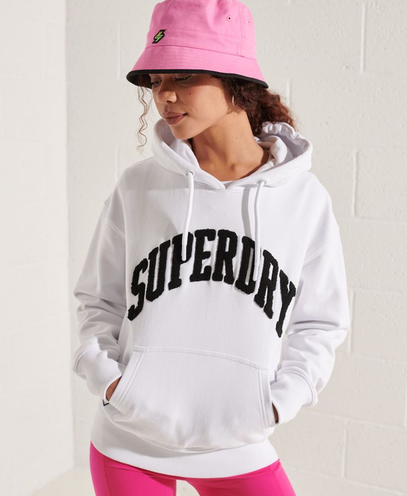 Whether you're looking for a chilled look, or a sporty vibe, we've got you covered with the Varsity Arch Mono Hoodie.Relaxed fit – the classic Superdry fit. Not too slim, not too loose, just right. Go for your normal sizeLong sleevesEmbroidered graphicFront pouch pocketDrawstring hoodRibbed cuffs and hemSignature logo patch