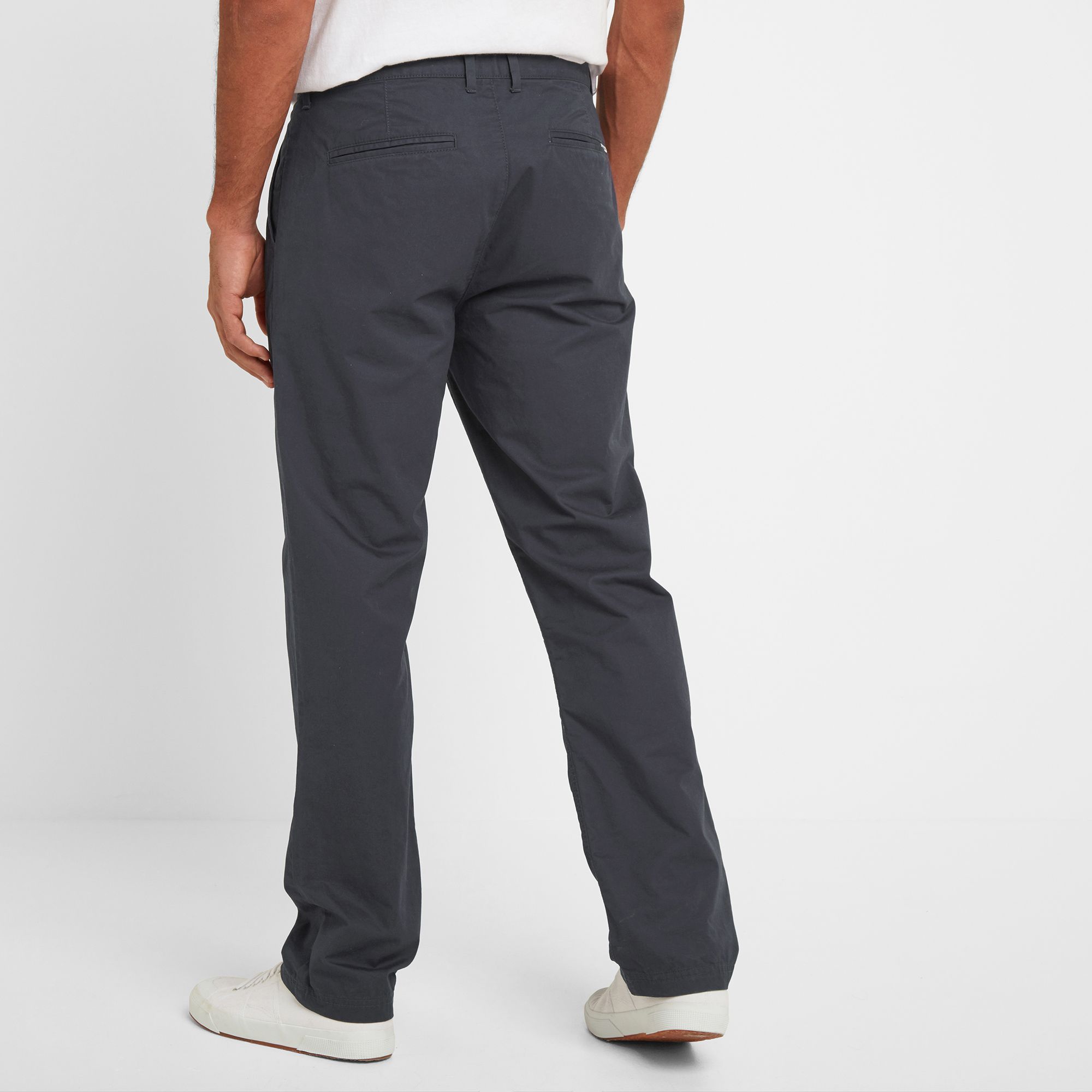 Designed in Yorkshire, these casual fit chinos are the ultimate versatile summer trousers made in a soft washed lightweight cotton. Smarter than jeans they're comfortable enough for a long walk through the countryside or along the cliffs and look right at home in the pub or wine bar at the end of the day. Our design team gave them a slightly longer leg that can be worn down or rolled up, and sits well over a walking boot or trainers. Darts at the back give them a great fit, and they hold securely at the waist with a hook and eye as well as a button. In keeping with our Truth Over Glory ethos,  the TOG24 branding is kept subtle with a tiny logo on the button and a woven label on the back pocket.