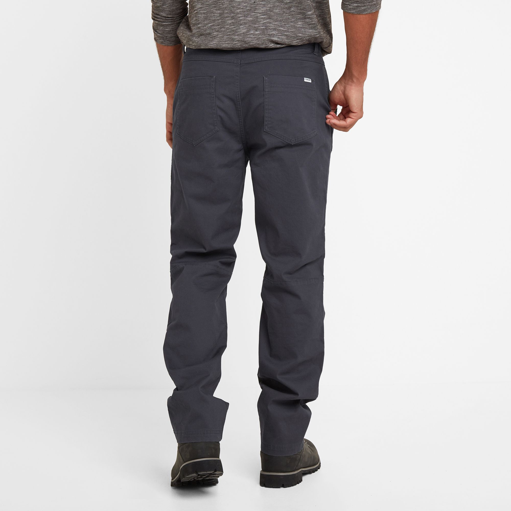 All the comfort of well designed walking trousers, with the looks of casual cotton trousers. Designed with long walks over the Yorkshire moors in mind, they'll also let you go straight from your hike into the pub for a pint and feel perfectly at home. The cut is shaped for ease of walking with a hem that can be worn down or rolled up. Lots of useful pockets means you have a place for your keys, phone map and wallet so you can travel light. As part of our commitment to the environment, the cotton is sustainably grown,  and our ethos of Truth Over Glory is evident in the TOG24 branding on the buttons and small woven label on the back.