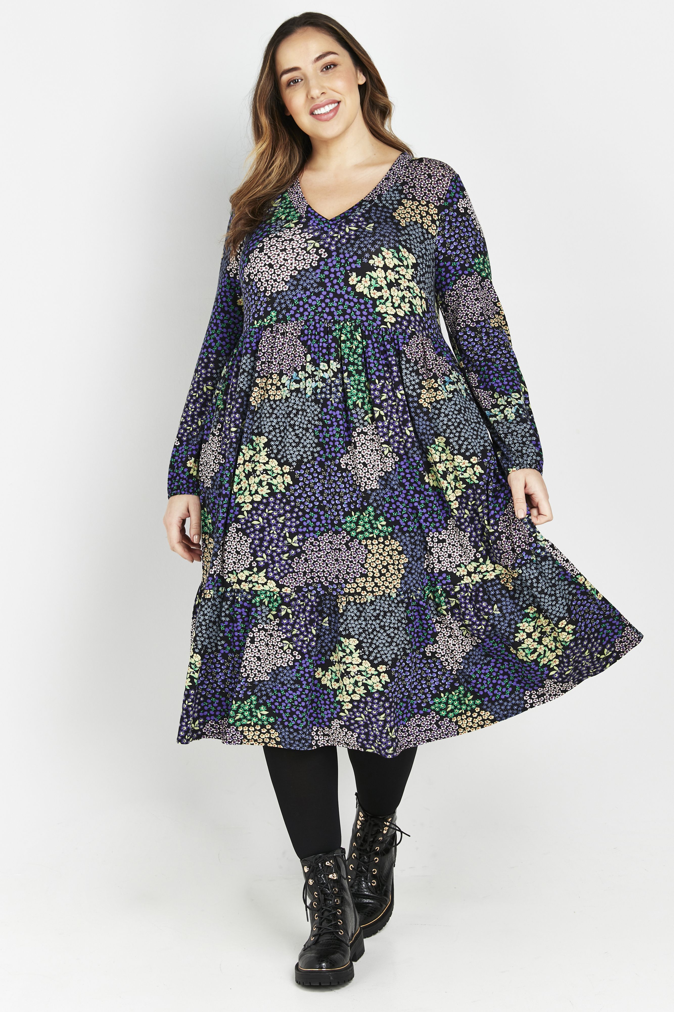 Flirt with florals this season in the cute Patchwork Floral Tiered Dress. A cute patchwork print will bring a pop of colour to your everyday wardrobe, whilst a relaxed floaty fit will have you wearing it on-repeat. Key Features Include: - V-neckline - Long sleeves - Functional side pockets - Relaxed fit - Midi length tiered skirt Style with tights and heeled ankle boots for a playful & effortless everyday look.