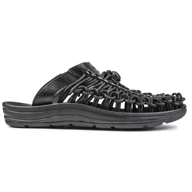 Womens black Keen uneek slide sandals, manufactured with leather and a rubber sole. Featuring: functional buckled strap, synthetic lining and footbed and premium leather upper.