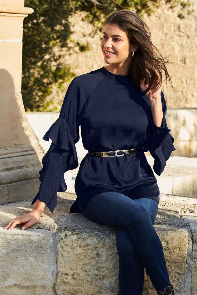 REASONS TO BUY: 

Because our navy tops are anything but boring
Ruffle sleeves for a statement silhouette
Flattering longline hem
So easy to wear - just throw on and go
Add a belt to show off your waist
Wear it with skinny jeans and bold ankle boots