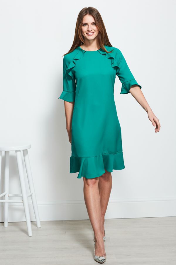 REASONS TO BUY: 

A shift with a twist
Body-skimming design: comfy and chic
Pretty ruffle trim to front, sleeves and hem
Emerald shade you'll wear year-round
Wear it with metallic heels for special occasions
Style with chic court shoes for work