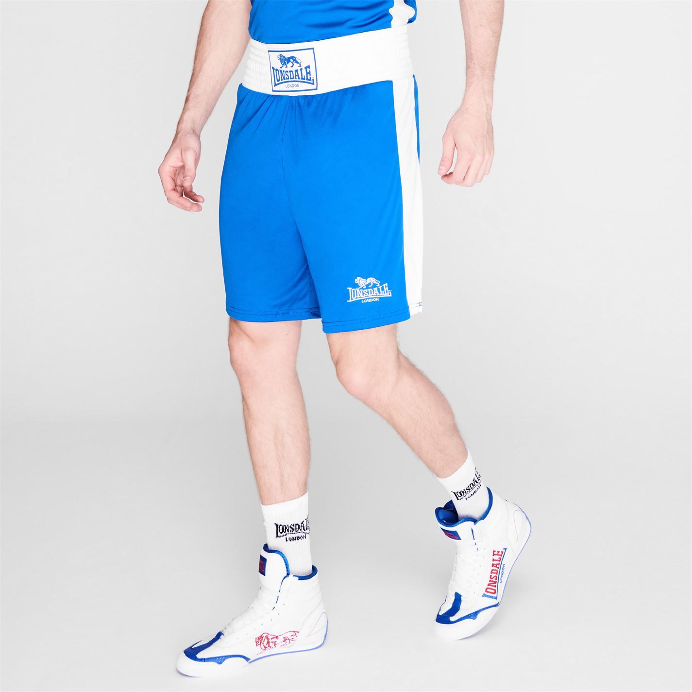<strong>Lonsdale Boxing Shorts Mens</strong><br><br> The <strong>Mens Lonsdale Boxing Shorts</strong> are ideal for competition or training use, featuring a wide waistband with elasticated trim offering up a comfortable fit. These <strong>Lonsdale shorts</strong> are finished off with the Lonsdale tag to the waist is complimented with the Lonsdale logo to the front and rear of the thighs for a classic look.<br>> <strong>Mens boxing shorts</strong><br>> Wide elasticated waistband<br>> Contrasting side panels<br>> Lonsdale tag and logo<br>> 100% Polyester<br>> Machine washable