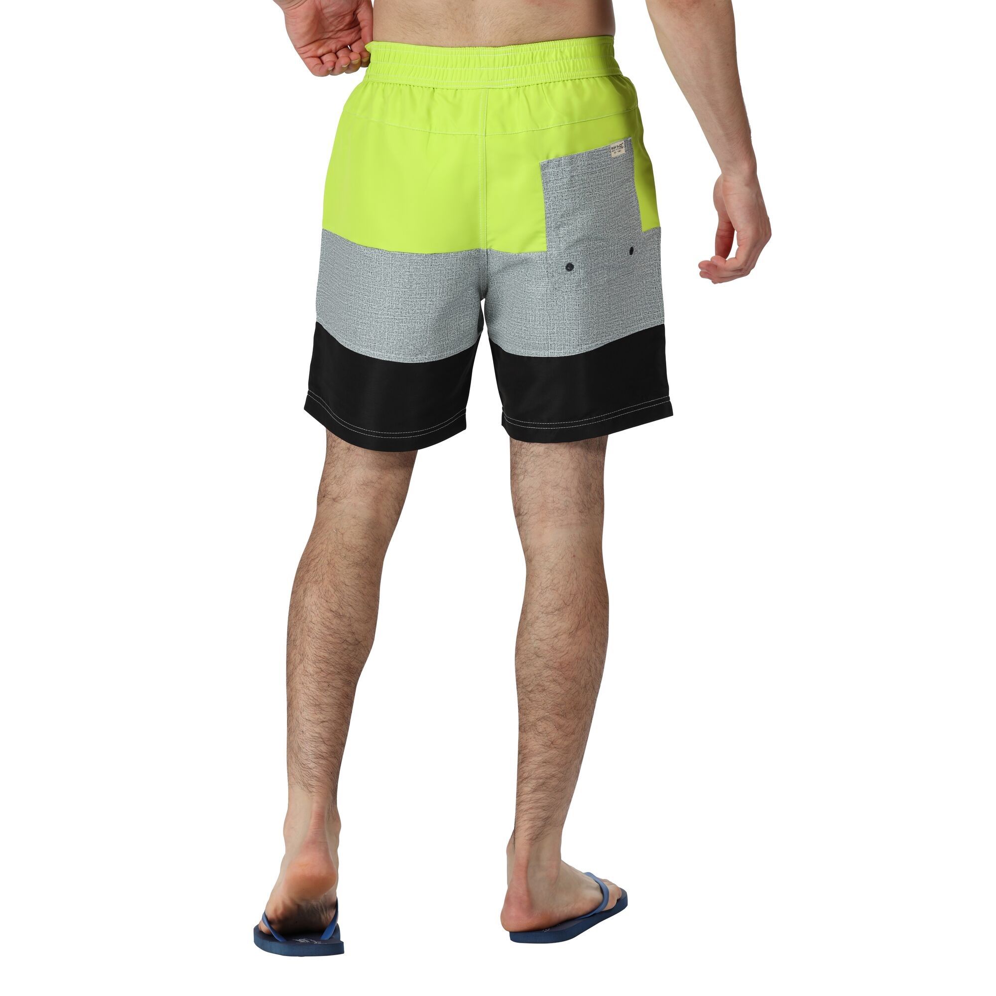 Material: 100% polyester taslan fabric. Quick drying fabric. Adjustable drawcord waist. 2 side pockets. 1 back pocket. Mesh brief liner with security pocket.