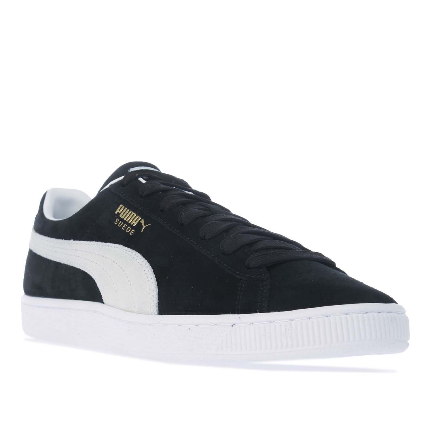Puma Suede VTG Trainers in black- white.- Leather and Suede upper.- Lace fastening.- Round toe.- Classic PUMA Formstrip down the sidewalls.- Branded insole.- Rubber outsole.- Leather and Suede Upper  Leather Lining  Synthetic Sole.- Ref: 37492105X