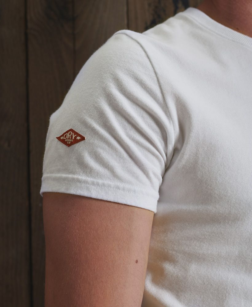 A classic tee made from a super-soft premium cotton, the Core Logo Woodstock T-shirt will look great paired with everything from shorts to jeans to complete the look this season.Slim fit – designed to fit closer to the body for a more tailored lookClassic crew necklineShort sleevesSuperdry logoSuperdry patch