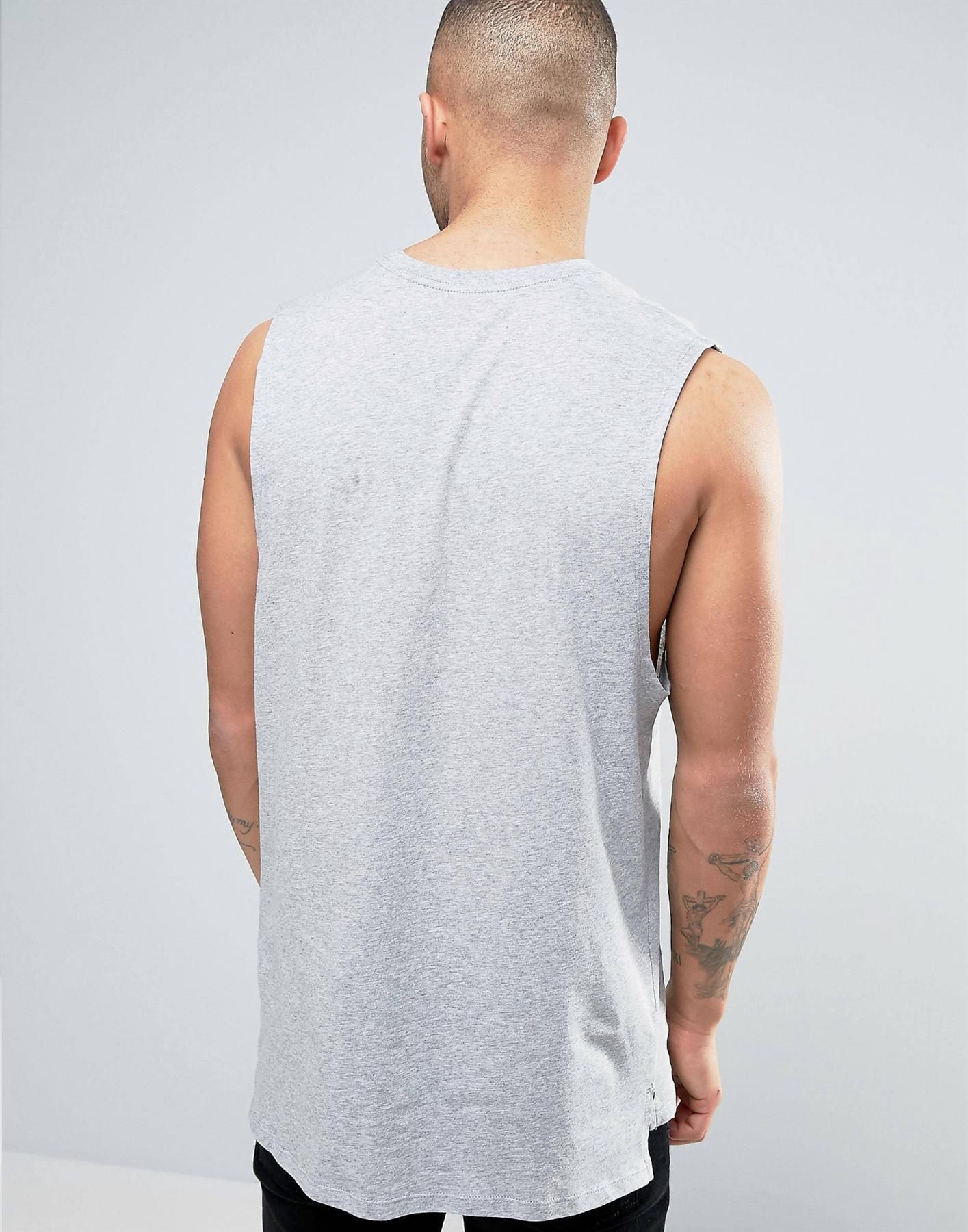 Nike Black Sleeveless T-shirt With Retro Logo.
Sleeveless Vest Shirt From Nike.
Breathable Cotton.
Round Neck.
Athletic Cut.