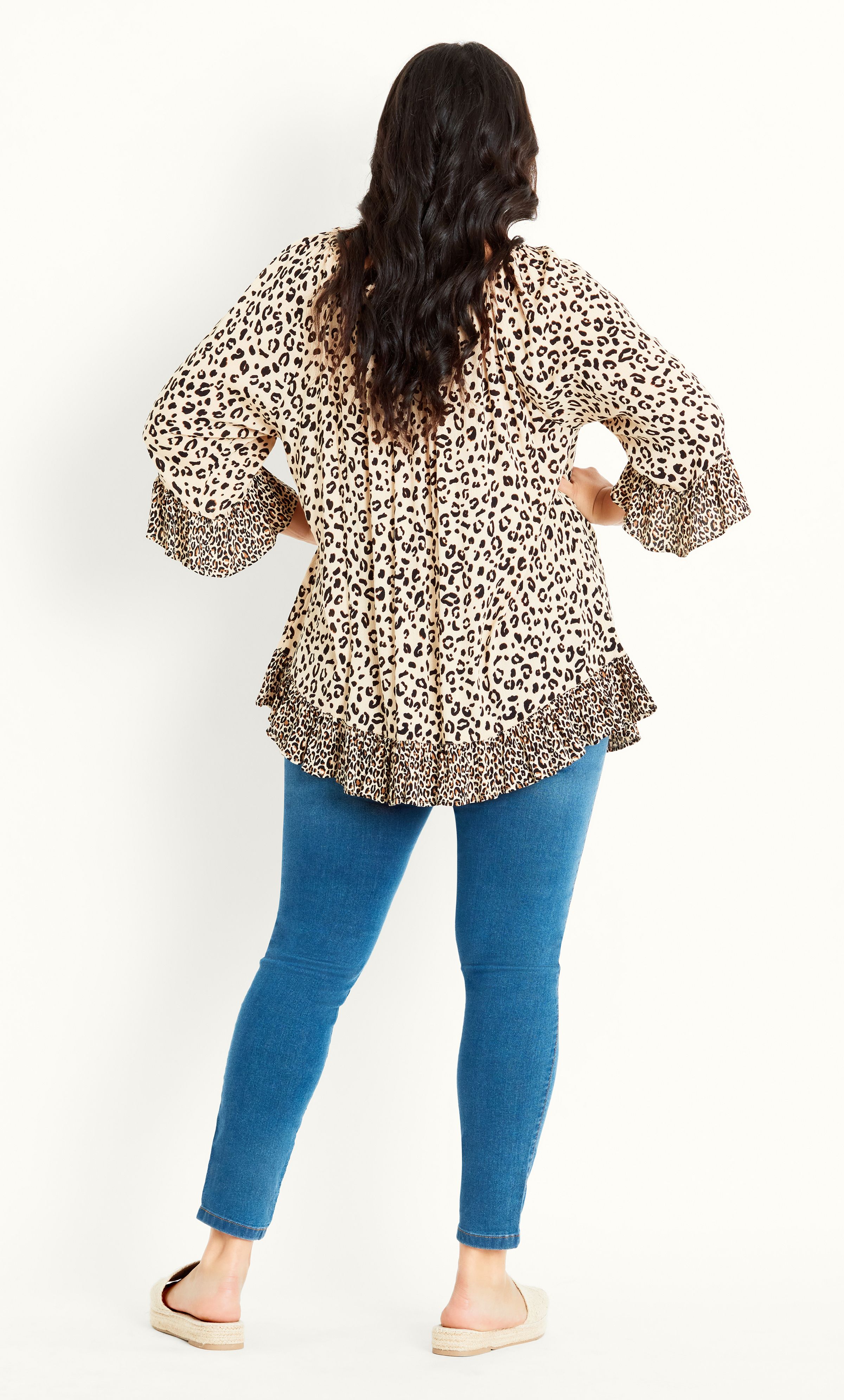 The Leopard Bardot Top breathes life into any wardrobe, offering an eye-catching leopard print that is bound to turn heads. Complete with flirtatious frills and a breezy relaxed fit, this top seamlessly combines effortless style with everyday comfort! Key Features Include: - Elasticated on-off shoulder neckline - 3/4 frilled sleeves - Lightweight non-stretch fabrication - Relaxed fit - Unlined - Pull over style - Hip length - Frilled hemline Team with skinny jeans and wood-stacked heels for a chic brunch look!