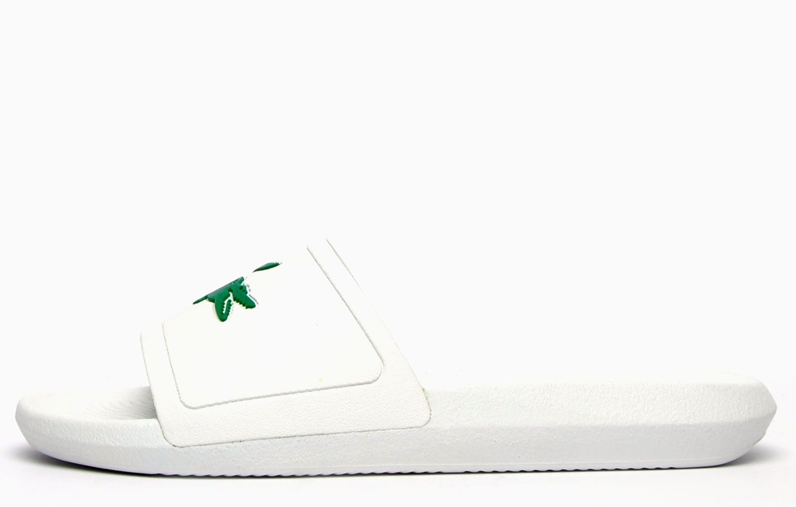 Head to the beach in style with these mens Lacoste Croco Slides. These on-trend sandals are crafted with comfort in mind whilst boasting a great water resistant super comfy footbed for a great fit and feel for the pool side and everyday wear. These designer slides are finished with eye catching Lacoste branding throughout just in case you want a sign of approval that youre wearing cool on trend style this summer season
 
 - Stylish synthetic upper
 - Comfort moulded footbed
 - Grippy outsole
 - Slip on wear
 - Iconic Lacoste branding throughout
 Please Note: These slides are supplied poly bagged (without box)
 These Lacoste Slides are sold as B grades which means there may be some very slight cosmetic issues on the shoe and they come in a poly bag. There could be occasional issues with wrong swing tags being allocated to wrong shoes by Lacoste themselves which could result in some size confusion but you must take the size IN THE SHOE as the size that the shoe actually is ( not what is on the tag ). We have checked most of the shoes and in our opinion,all are practically perfect without any blemishes on them at all and in essence if the shoes did not have the letter B denoted on the swing tag you would presume these were perfect shoes. All shoes are guaranteed against fair wear and tear and offer a substantial saving against the normal high street price. The overall function or performance of the shoe will not be affected by any minor cosmetic issues. B Grades are original authentic products released by the brand manufacturer with their approval at greatly reduced prices. If you are unhappy with your purchase, we will be more than happy to take the shoes back from you and issue a full refund