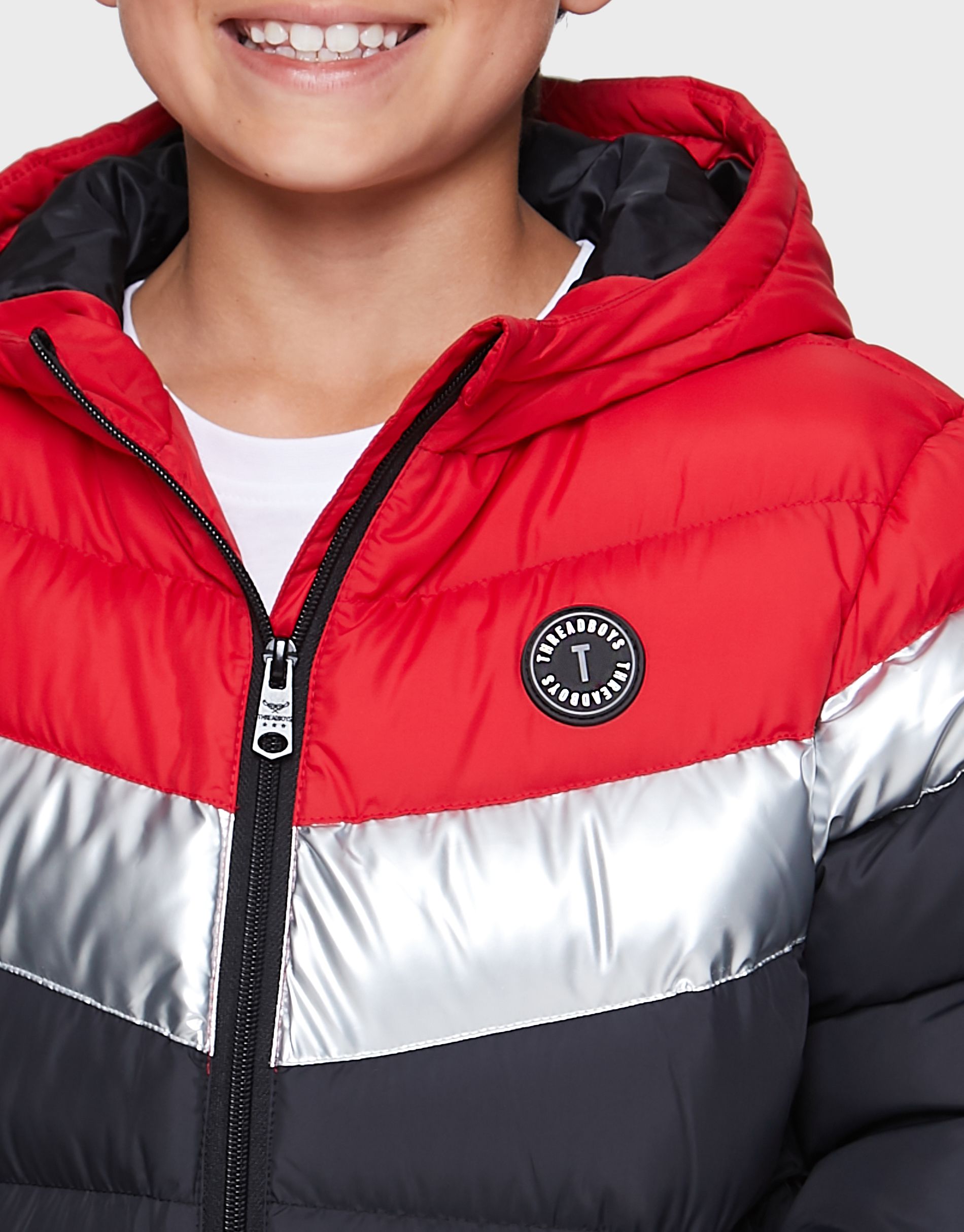This colourblock style hooded jacket from Threadboys features a zip fastening, two side pockets and branding badge on the chest. It has an elasticated hem and cuffs, an essential for this season. Other colour and styles available.