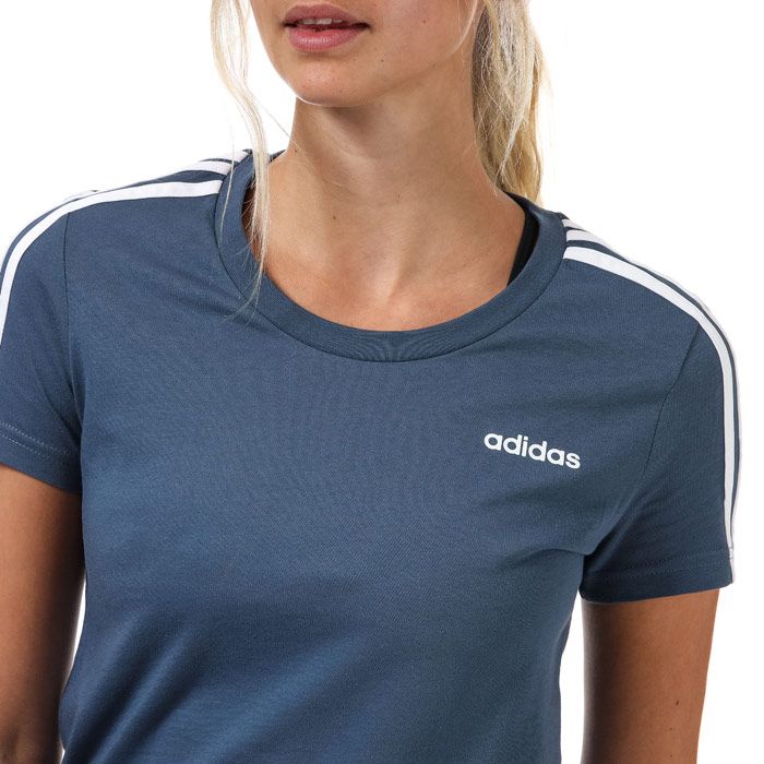 Womens  adidas Essentials 3- Stripes T- Shirt in blue- white.- Ribbed crewneck.- Short sleeves.- 3-Stripes to the sleeves.- adidas linear logo printed at left chest.- Slim fit.- 100% Cotton.  Machine washable.- Ref: EI0765