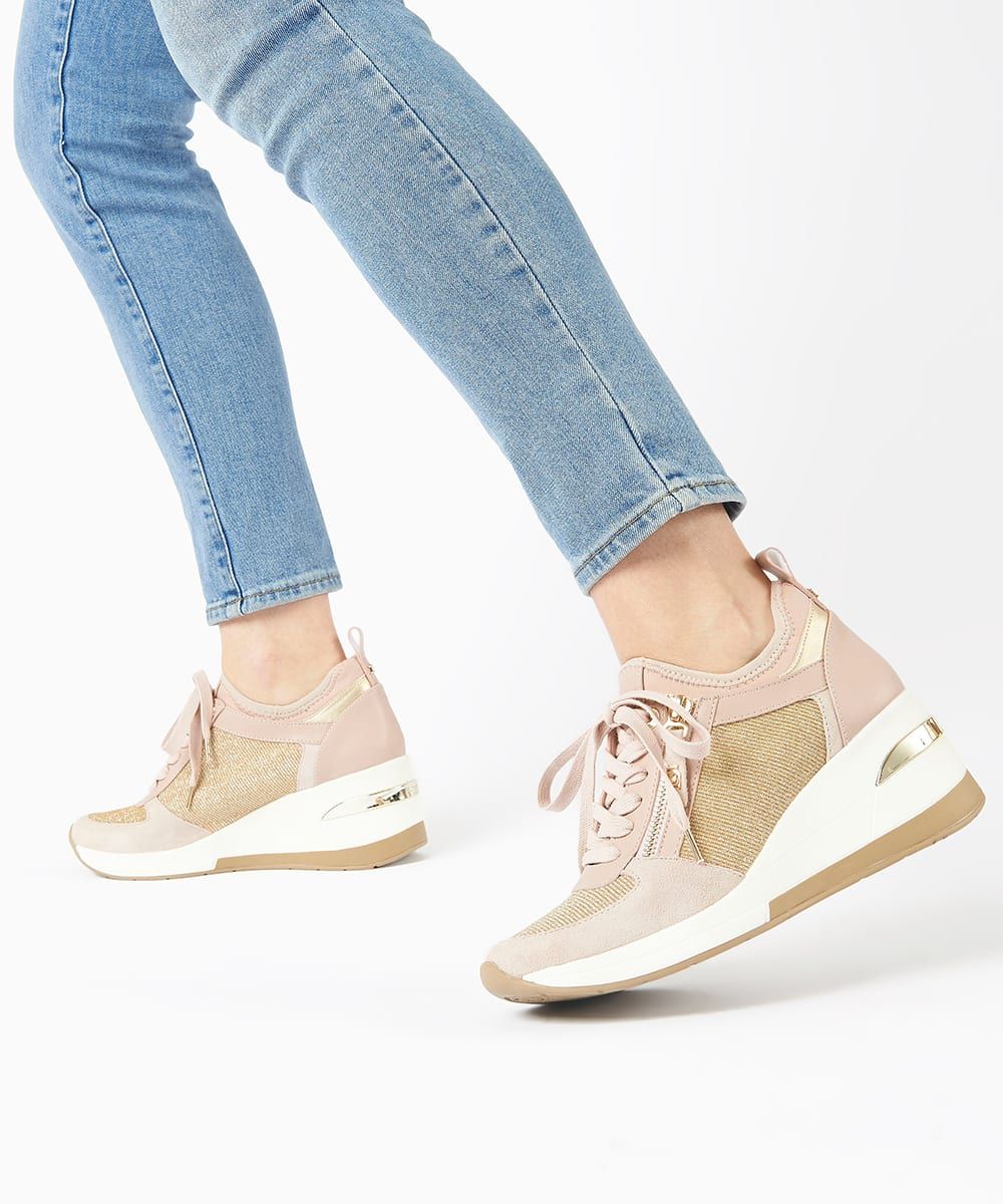 Elongate your legs and elevate your style with these wedge trainers. This lace-up style has zip detailing down the front for a modern, sporty look. Made from a combination of soft textured fabrics they are light-weight and the soft wedge sole adds ex