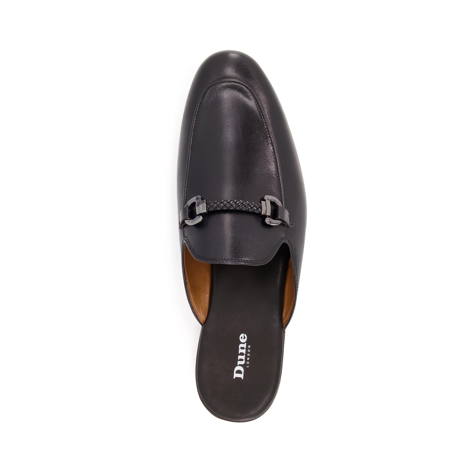 Upgrade your selection of suave footwear with these smart loafers. Their backless silhouette is both comfortable and on-trend.