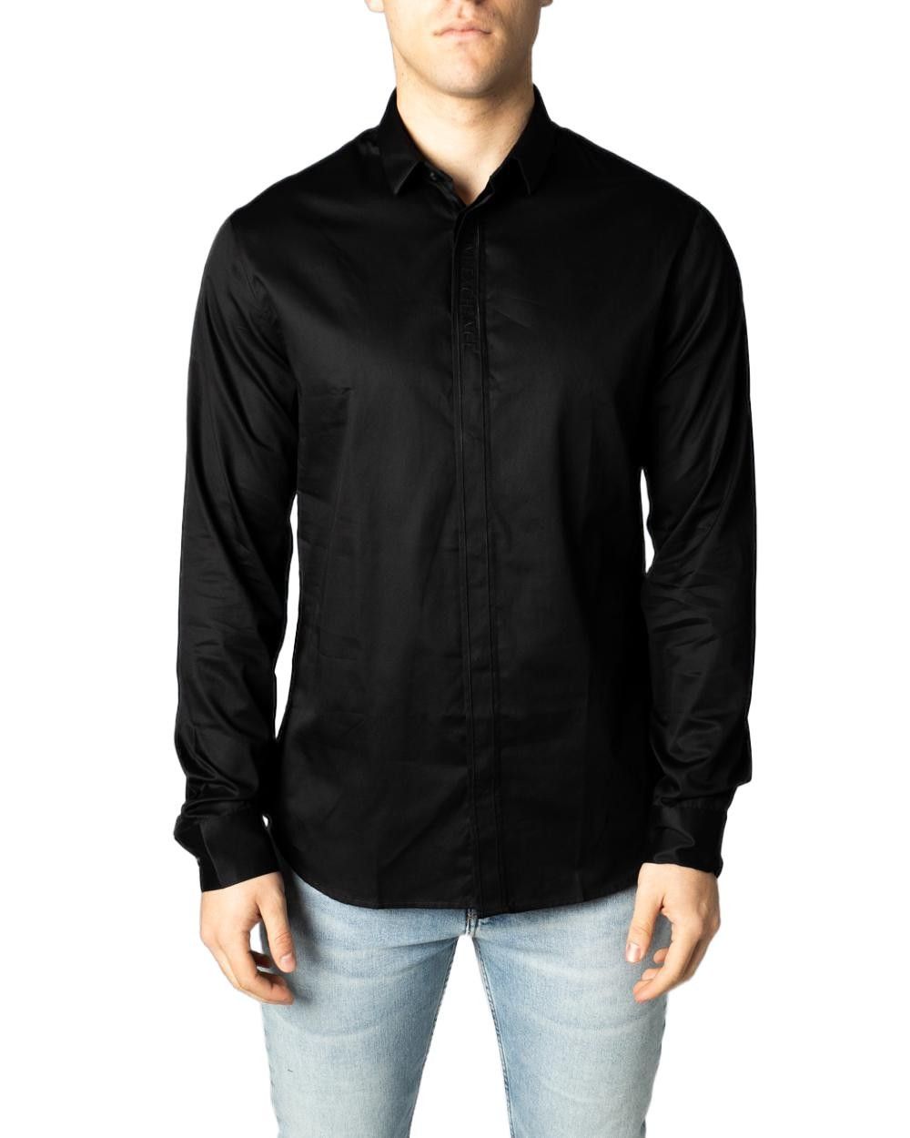 Brand: Armani Exchange
Gender: Men
Type: Shirts
Season: Spring/Summer

PRODUCT DETAIL
• Color: black
• Pattern: plain
• Fastening: buttons
• Sleeves: long
• Collar: classic

COMPOSITION AND MATERIAL
• Composition: -100% cotton 
•  Washing: machine wash at 30°