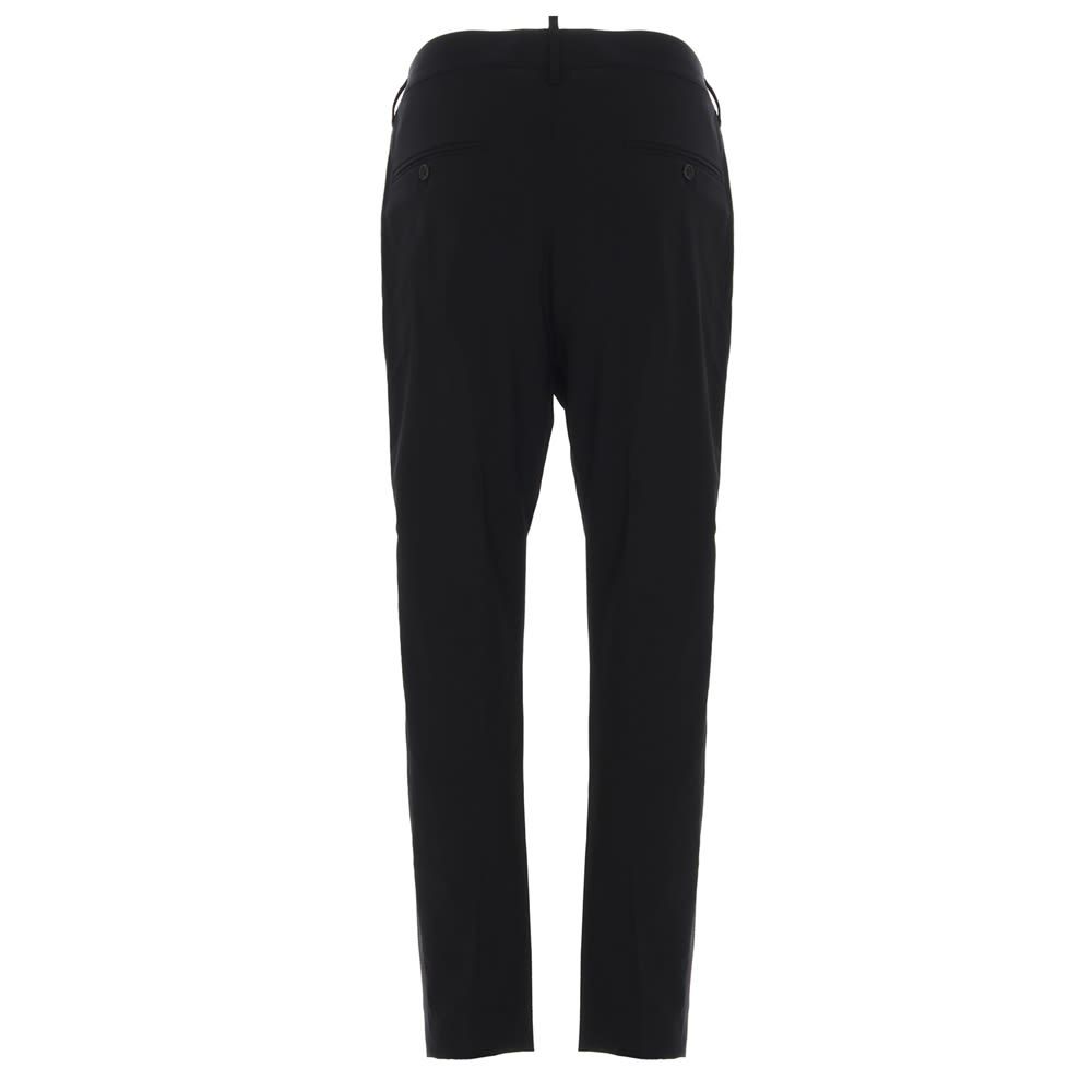 Dsquared 2 'Cargo' black cotton trousers with elasticated insert waist, zip and button fly and mesh insert with logo print.