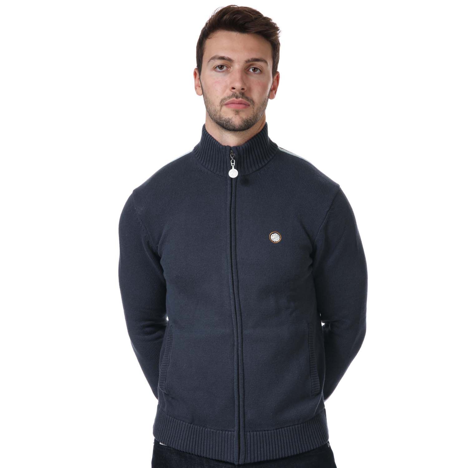 Mens Pretty Green Tilby Knit Track Top in navy.- Ribbed stand up collar.- Full front zip fastening.- Two pouch pockets.- Pretty Green logo embossed metal zipper.- Ribbed cuffs.- Stripe detail.- Stretch ribbed waistband.- Pretty Green logo on the left of the chest.- Top stitch detail.- 100% Cotton.- Ref: G21Q3MUTRA645N