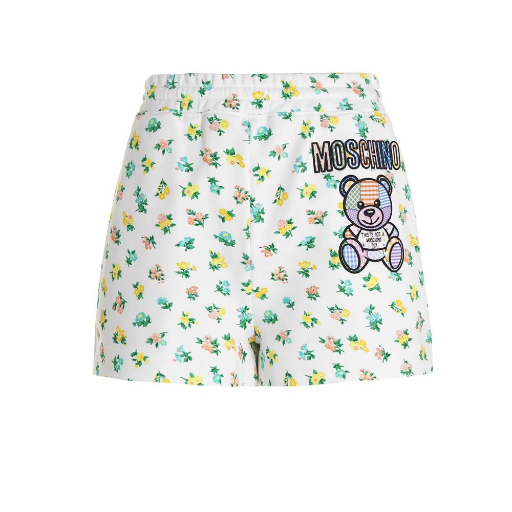 'Teddy' cotton shorts with all-over floral print, elastic waistband and logo patch.
