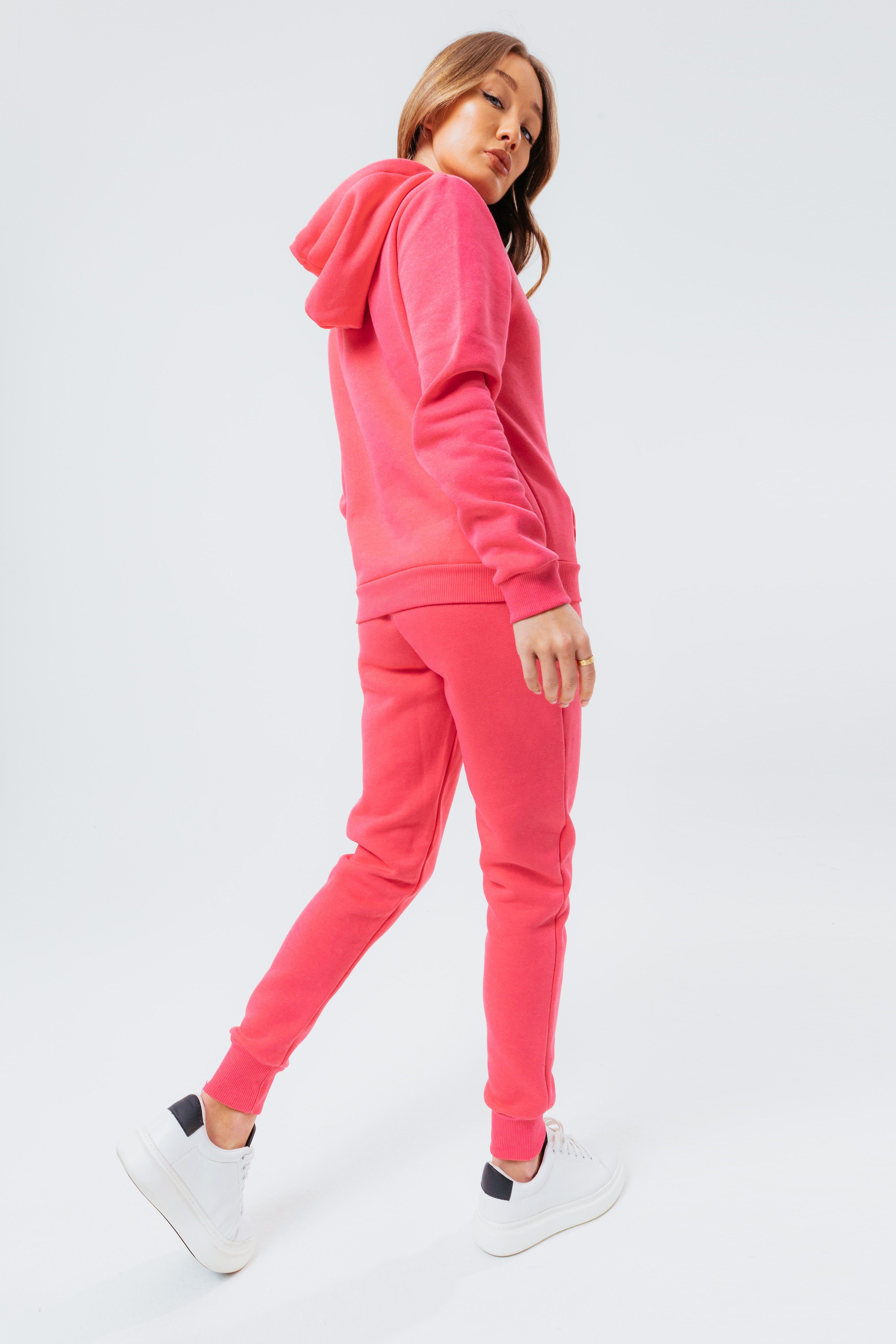 Introducing the freshest loungewear set you've ever seen! The Hype Candy With Tonal Signature Script Women'S Hoodie & Jogger Set is your new go-to loungewear set when you need that extra comfort boost. Designed in 80% Cotton 20% Polyester for the ultimate soft touch feeling! The Hoodie features a fixed hood, kangaroo pocket, fitted hem and cuffs, finished with drawstring pullers and embossed justhype embroidery across the front in the same colour. The Joggers highlight an elasticated waistband, fitted cuffs and double pockets with tonal drawstring pullers and embossed justhype embroidery on the side of the leg. Wear together or stand alone with a pair of box fresh kicks. Machine washable. 