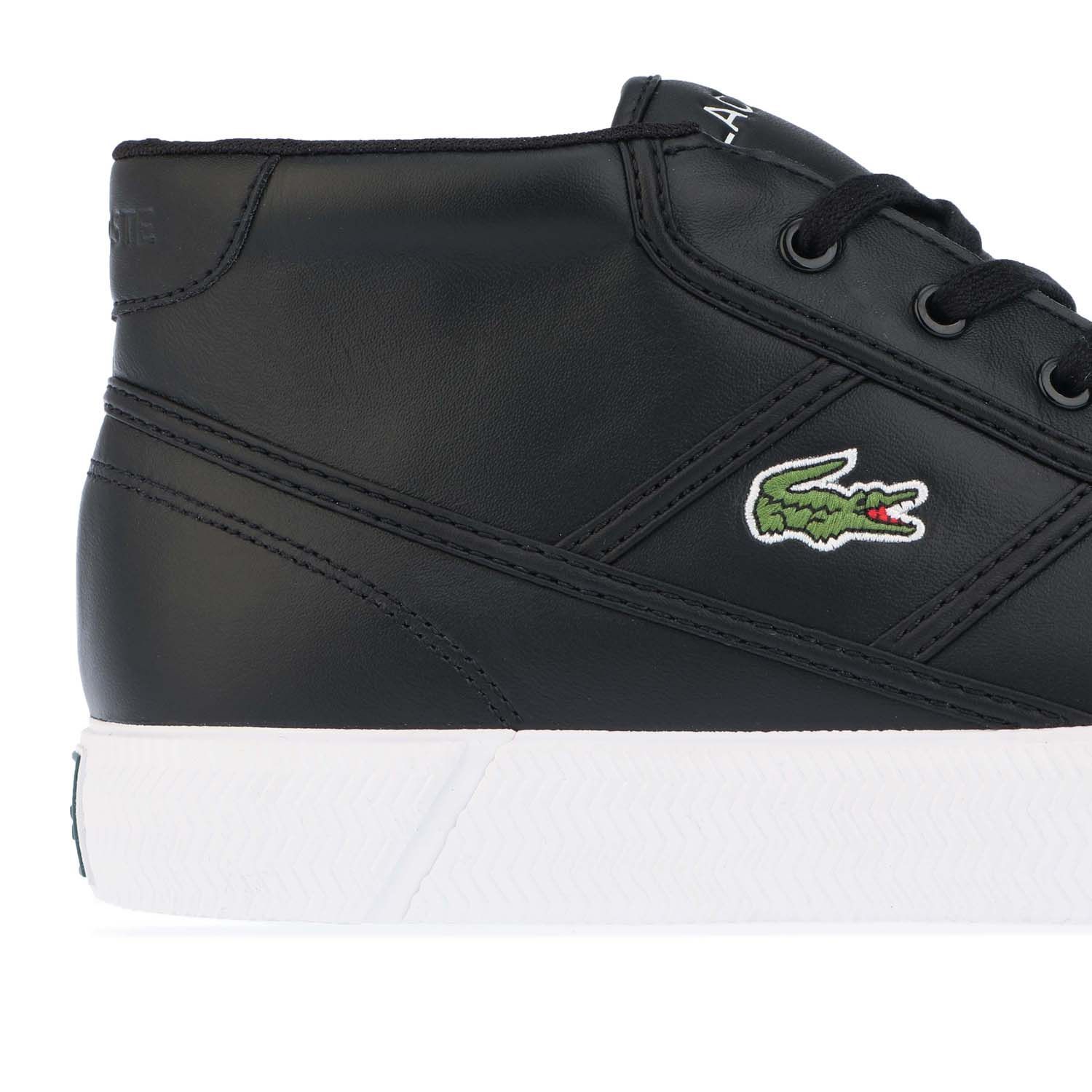 Mens Lacoste Gripshot Chukka Trainers in Black- Canvas and leather uppers.- Lace up fastening with comfortable flat laces.- Comfortable textile lining.- Ortholite sockliner for comfort and odour control.- Embroidered Lacoste lettered branding at tongue.- Contrast heel patch with debossed Lacoste lettered branding.- Embossed crocodile at back heel.- Embroidered crocodile to side.- Rubber sole.- Ref: 742CMA0035312