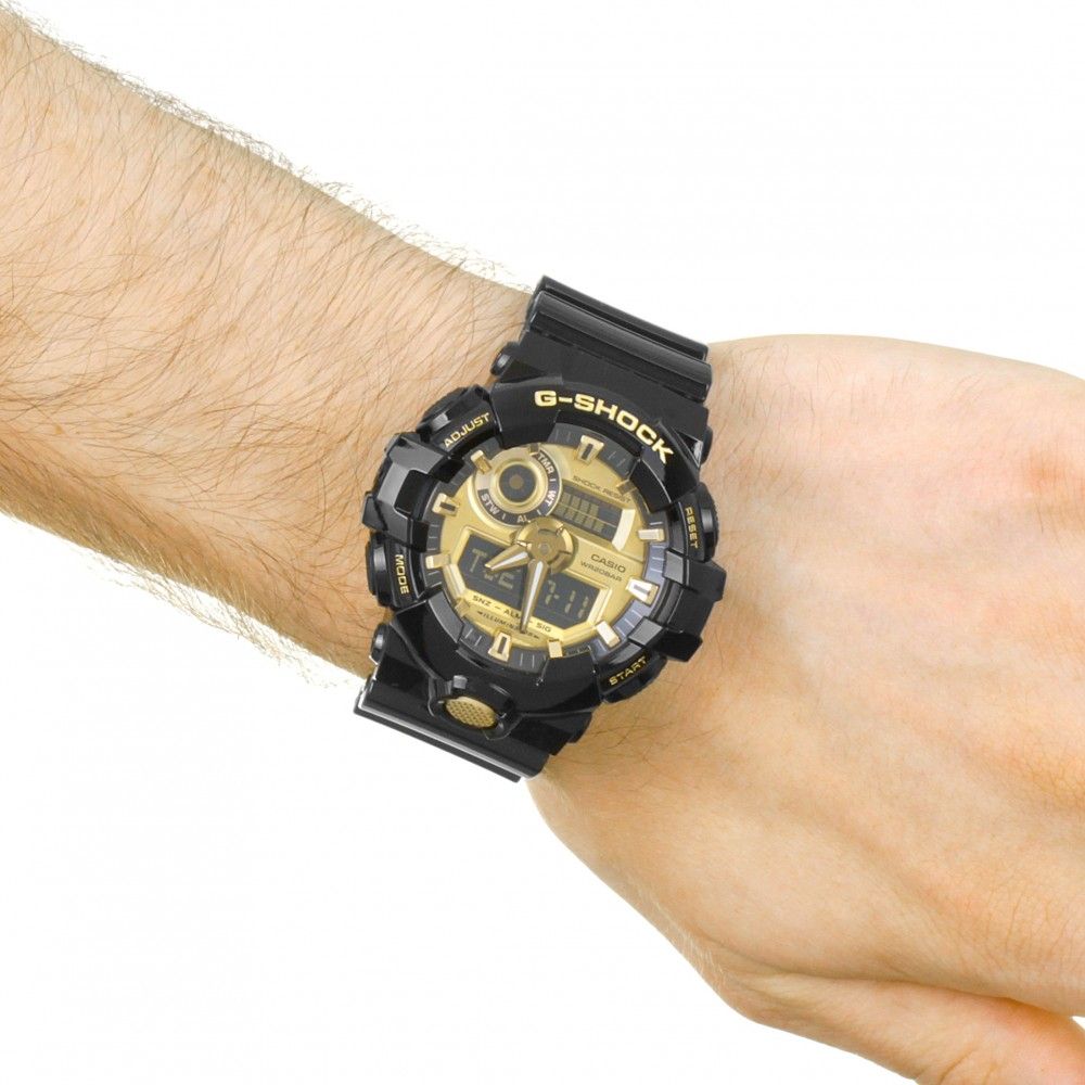 This Casio G-shock Analogue-Digital Watch for Men is the perfect timepiece to wear or to gift. It's Black 53 mm Round case combined with the comfortable Black Plastic will ensure you enjoy this stunning timepiece without any compromise. Operated by a high quality Quartz movement and water resistant to 20 bars, your watch will keep ticking. This sporty and trendy watch is a perfect gift for New Year, birthday,valentine's day and so on -The watch has a calendar function: Day-Date, Worldtime, Stop Watch, Countdown, Alarm, Light High quality 21 cm length and 22 mm width Black Plastic strap with a Fold over with Buckle Case diameter: 53 mm, case thickness: 13 mm, case colour: Black and dial colour: Gold
