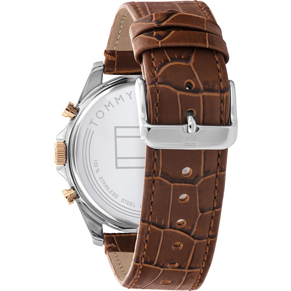 This Tommy Hilfiger Baker Multi Dial Watch for Men is the perfect timepiece to wear or to gift. It's Silver 44 mm Round case combined with the comfortable Brown Leather watch band will ensure you enjoy this stunning timepiece without any compromise. Operated by a high quality Quartz movement and water resistant to 5 bars, your watch will keep ticking. Get all the comfort with this fashionable croco-embossed leather band, perfect for every occasion  -The watch has a calendar function: Day-Date High quality 21 cm length and 21 mm width Brown Leather strap with a Buckle Case diameter: 44 mm,case thickness: 10 mm, case colour: Silver and dial colour: White