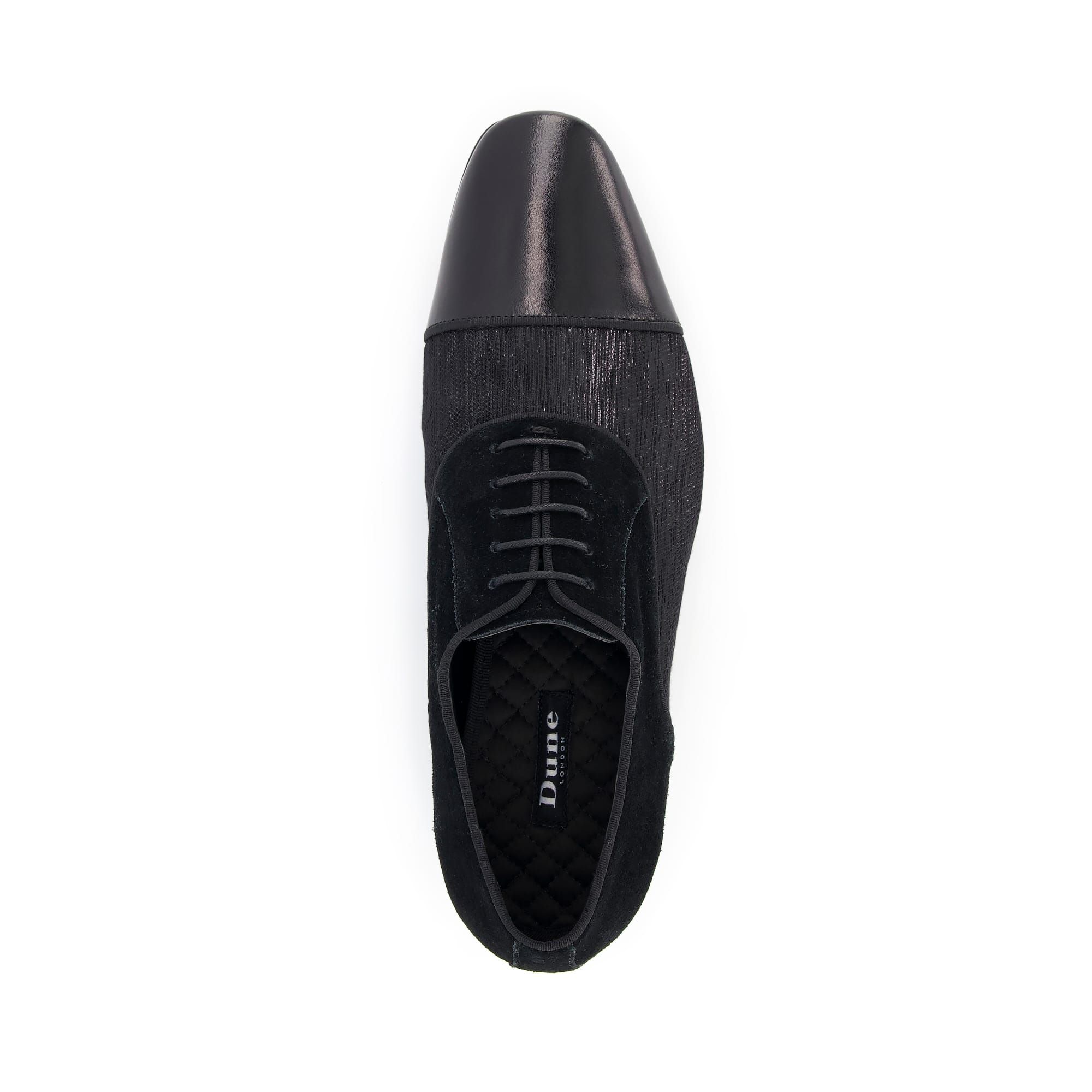 With a welcome return to formal dressing this dapper style with a streamlined silhouette will be your go-to shoes for occasion dressing. Comprised from three complementing textures the velvet sock, contrast fabric vamp and high shine leather toe cap