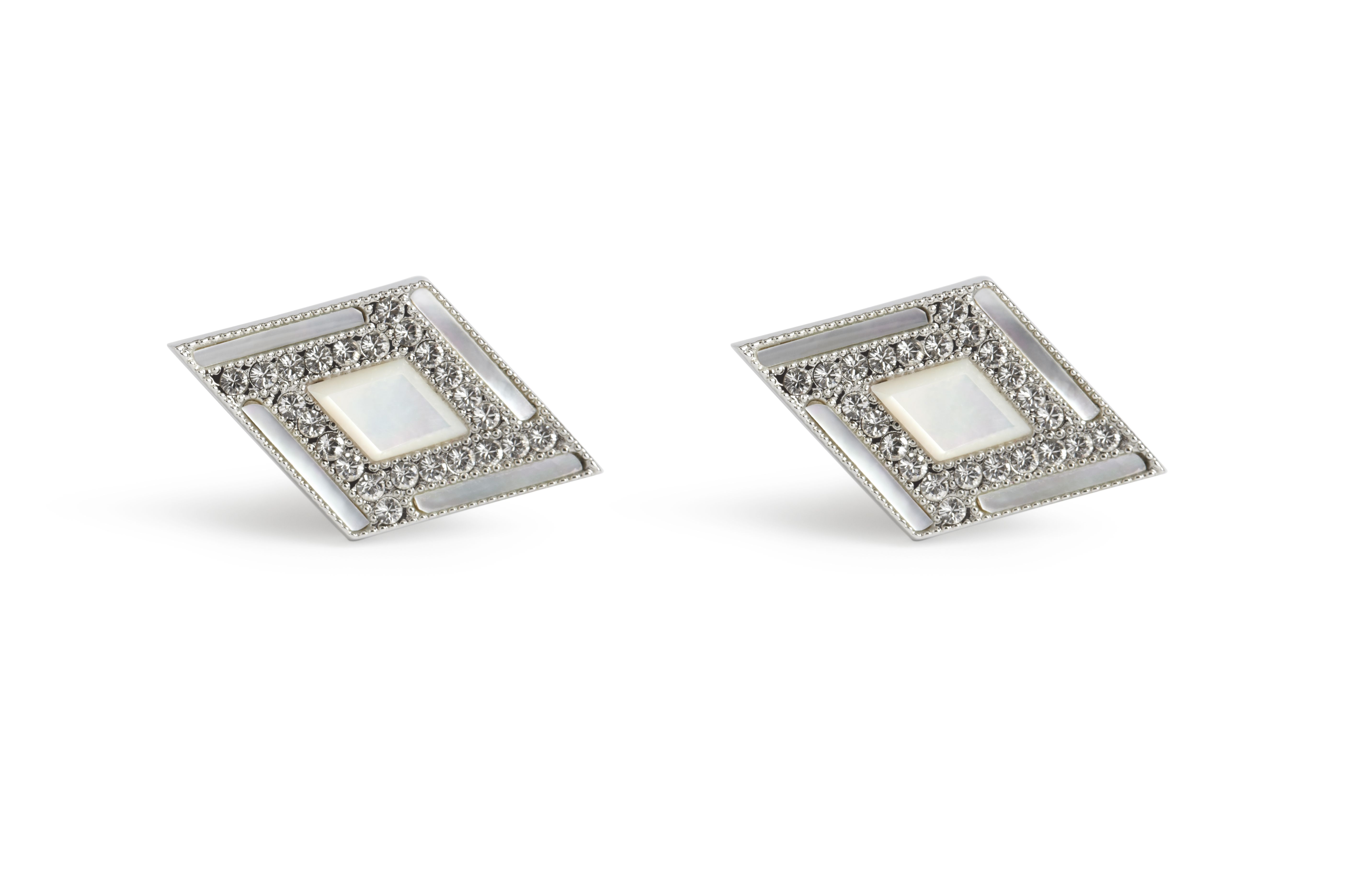 Add a flash of eye catching sparkle to your cuff with this art deco inspired cufflink.  Pure Simon Carter - understated, inspired.  A charming composition of mother of pearl stones hand set with Swarovski crystals all delivered with our renowned attention to detail