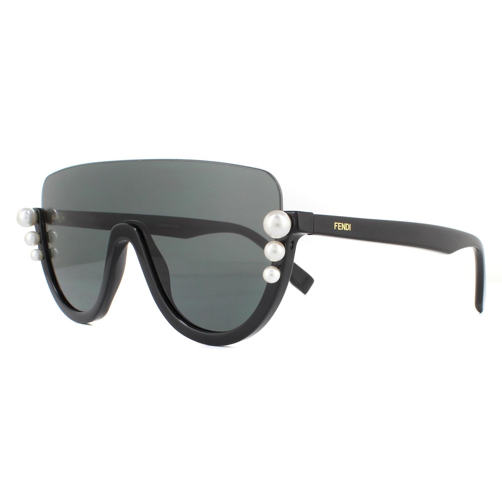 Fendi Sunglasses FF0296/S 807 IR Black Grey are a truly unique style with an upside down style design with the frame at the bottom and rimless at the top. 3 decreasing size pearls feature at the sides for a luxury embellishment.