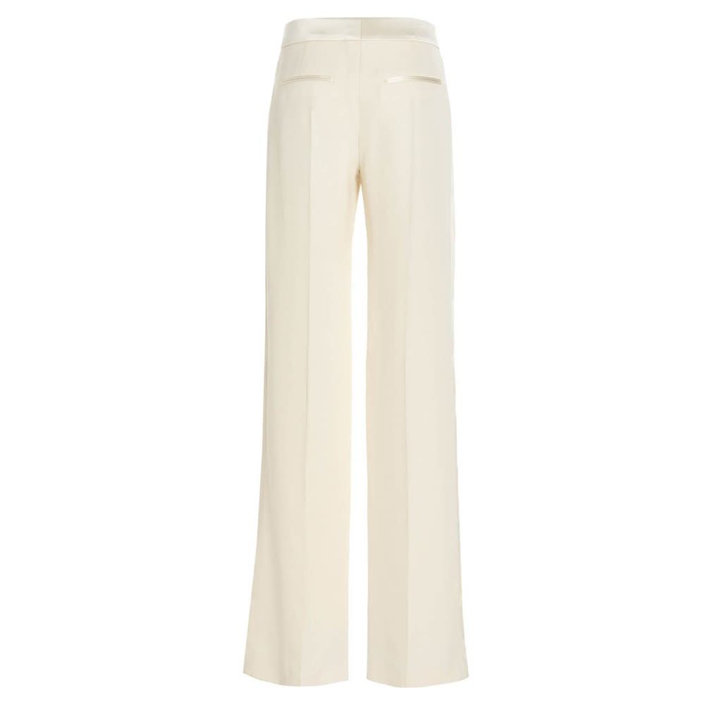 'Antique' viscose trousers featuring a straight leg with a central crease and a high waist.