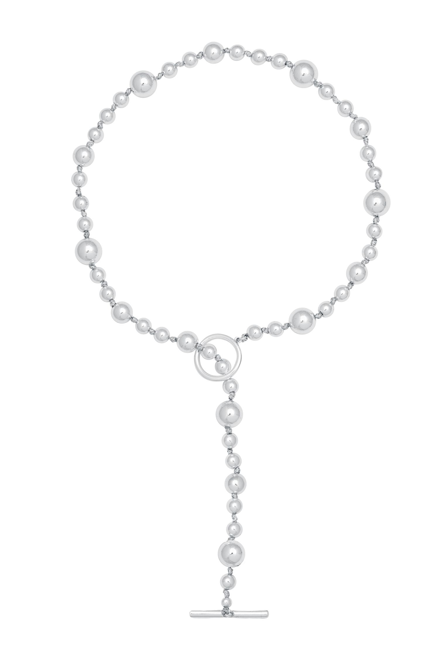 The Silver Artisan Ball Necklace is a classic piece that can be worn with any outfit. Featuring a chain of silver plated balls on a front hoop and bar fastening, it is an elegant way to add glamour or style to any occasion. Measuring 17cm in total length but can be worn at any length with a drop.