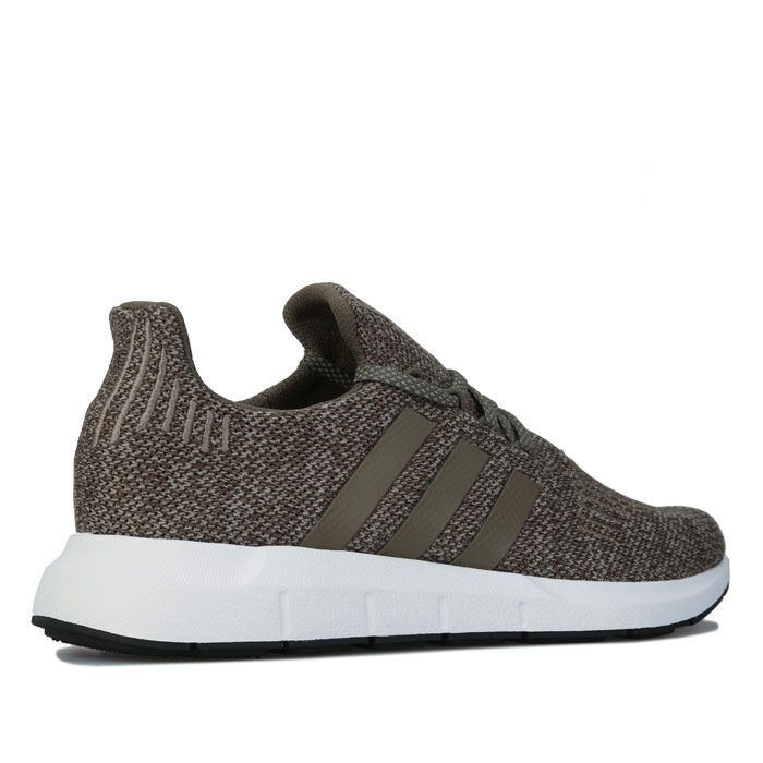 Mens adidas Originals Swift Run Trainers in khaki. – Textile and synthetic upper. – Sock-like construction hugs the foot. – Welded 3-Stripes. – Stretch knit upper with embroidery and TPU details. – Comfortable textile lining. – Stretch mesh lining. – Lightweight EVA midsole; Enjoy the comfort and performance of OrthoLite® sockliner. – Rubber outsole. – Textile and synthetic upper – Textile and synthetic lining – Synthetic sole. – Ref: EE6552