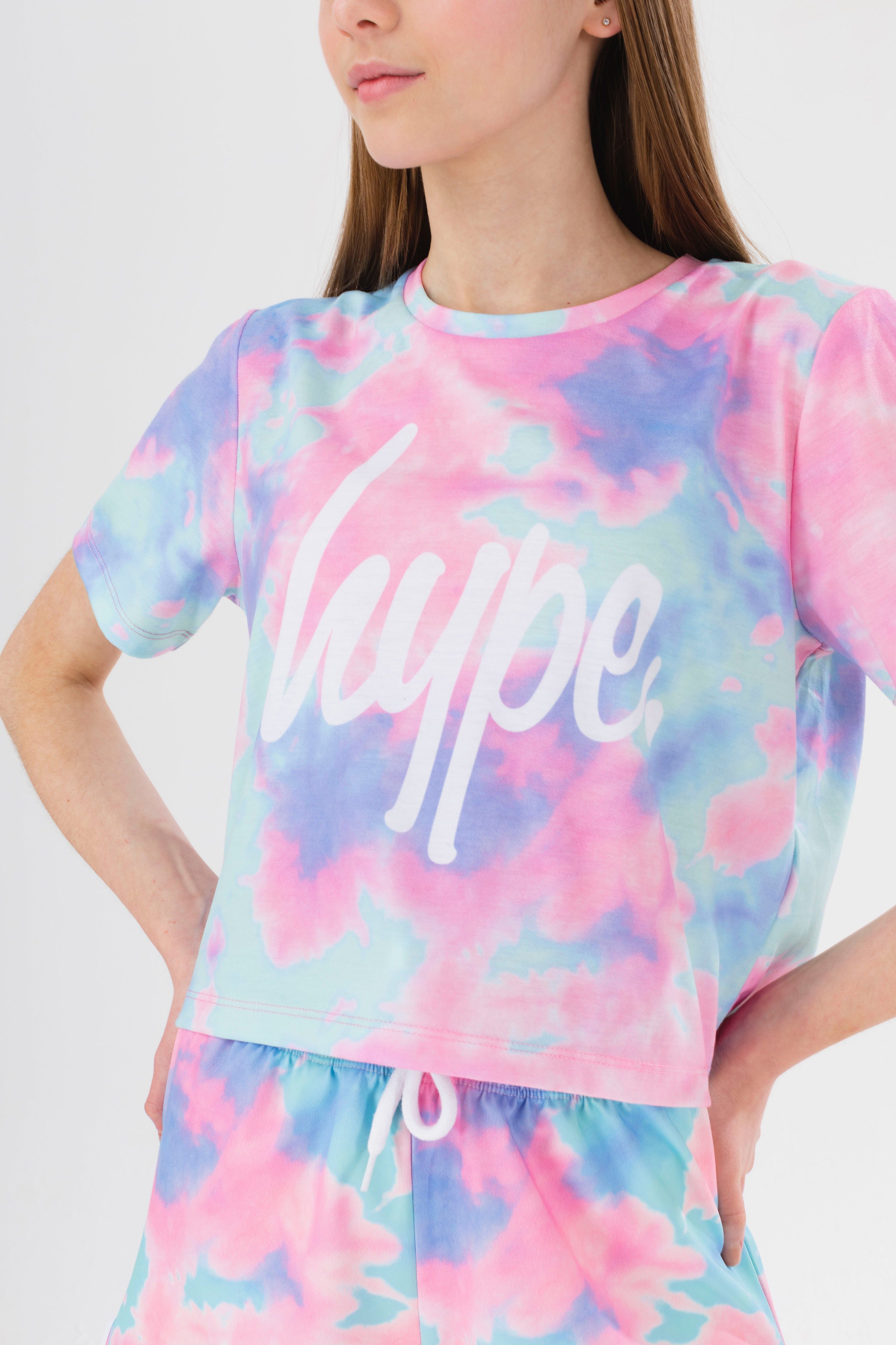The HYPE. Multi Dream Smudge Script Crop Tee is your new go-to tee. Designed in 100% cotton base for supreme comfort in our standard crop t-shirt shape, highlighting a crew neck line and short sleeves. With an all-over multicoloured dream smudge print and finished with the iconic HYPE. script logo in a contrasting white. Wear with cycle shorts for an on-trend look. Machine wash at 30 degrees.