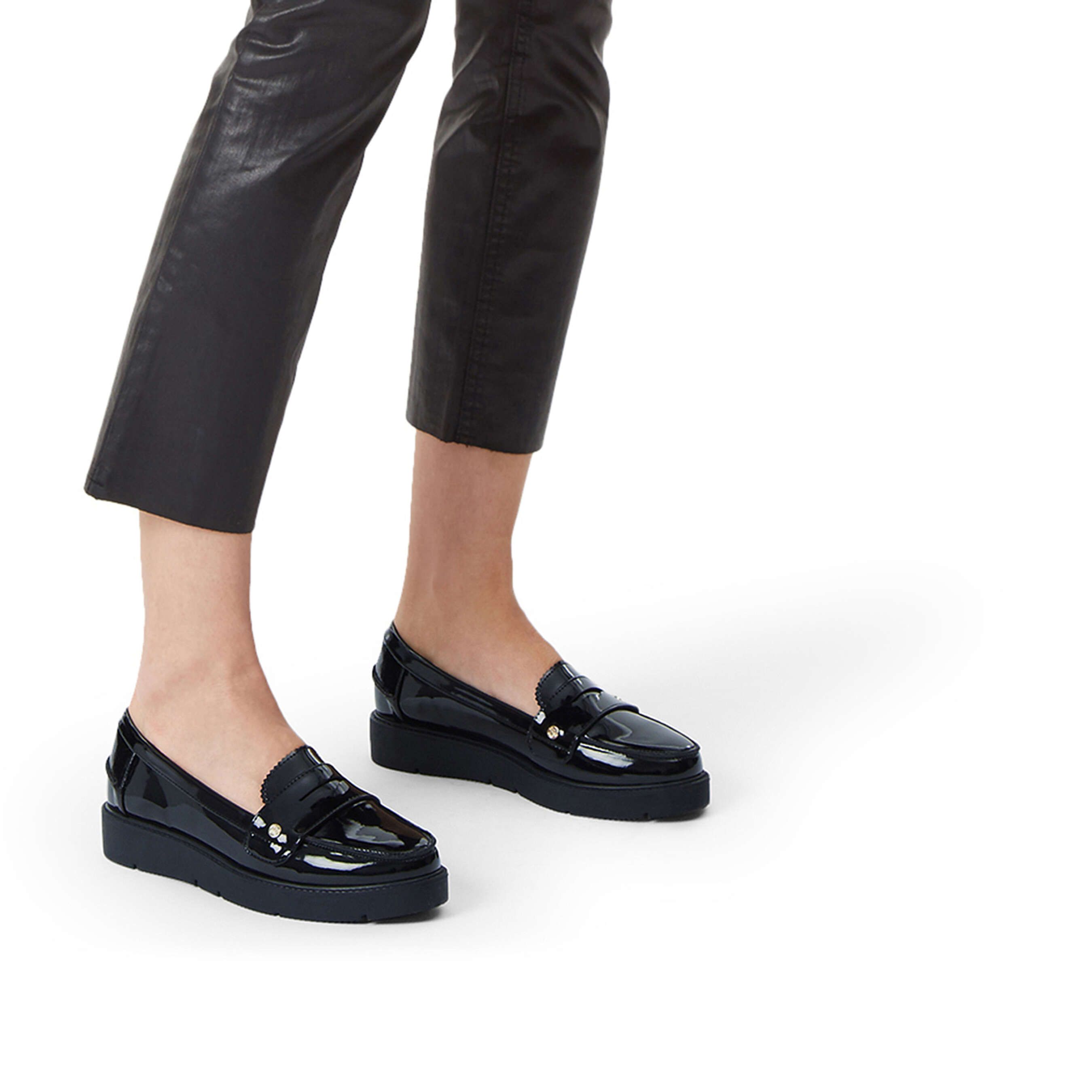 Work some polish into your professional looks with Miss KG's seductive Nieve loafer. This easy slip-on style is crafted in glossy black patent with a hardware pin and a touch of height hidden in the platform sole.