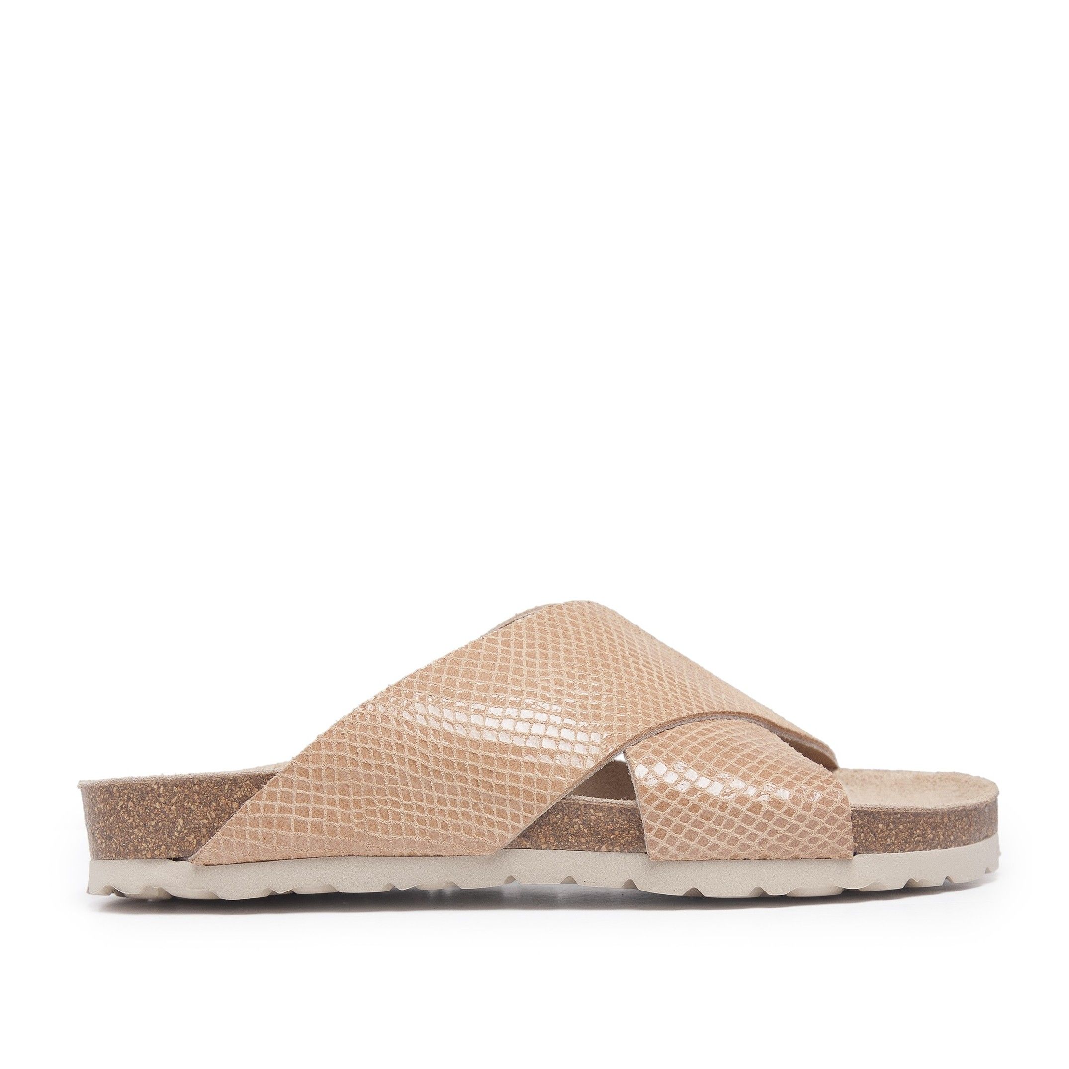 Bio sandal with crossed strips in leather with snake finish. Upper, inner and insole made of leather. Platform: 1 cm. Sole: EVA. This product is manufactured in Spain.