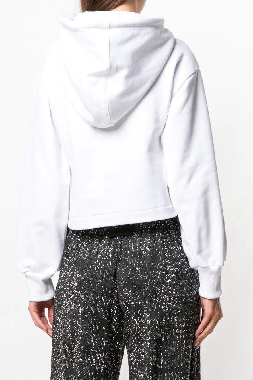 Brand: Diesel
Gender: Women
Type: Sweatshirts
Season: All seasons

PRODUCT DETAIL
• Color: white
• Pattern: print
• Sleeves: long
• Collar: hood

COMPOSITION AND MATERIAL
• Composition: -100% cotton 
•  Washing: machine wash at 30°