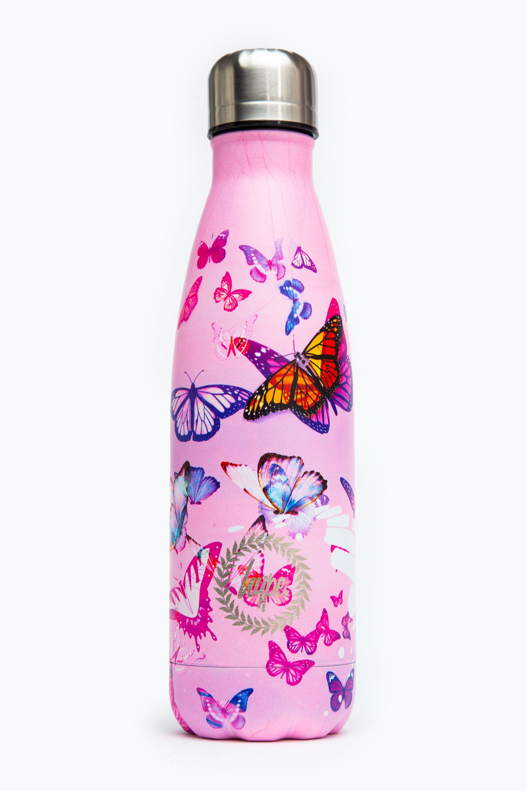Meet the HYPE. Pink Butterflies Metal Reusable Bottle, perfect for when you're on the go. Designed in Aluminium to ensure your water stays ice-cold and for chillier days, keeping your oat milk latte warm for longer. The design features a pastel pink base with an all-over butterfly overlay in a contrasting pink, purple and peach colour palette. Finished with the iconic HYPE. crest logo in white on the front. Why not grab one of our lunch bags or backpacks with a bottle holder to complete the look, we suggest grabbing the matching set.
